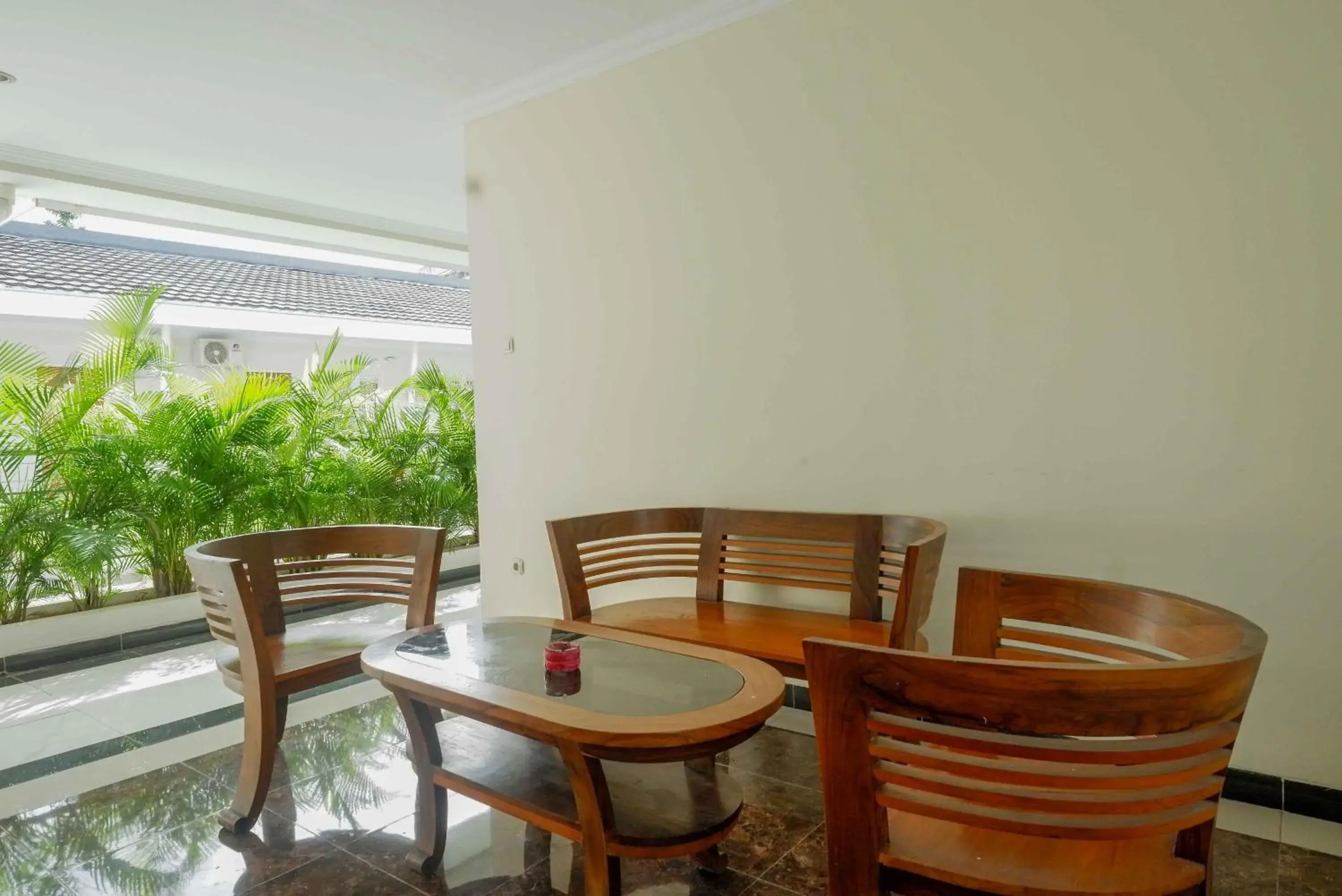 Patio in Urbanview Hotel Syariah Casa Azmya Yogyakarta by RedDoorz Patio in Urbanview Hotel Syariah Casa Azmya Yogyakarta by RedDoorz