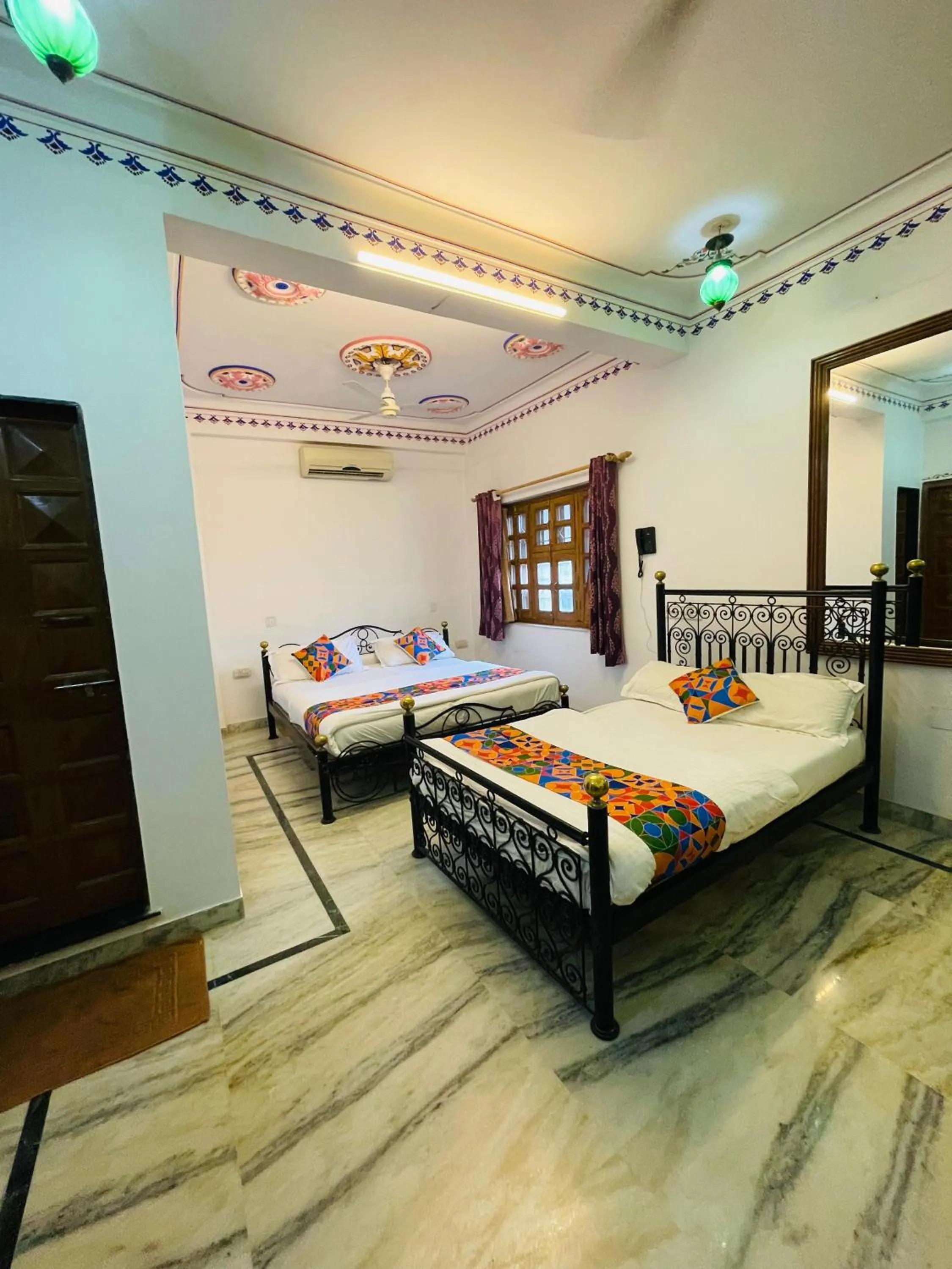 Bed in Baba Palace - A Heritage Hotel, Udaipur