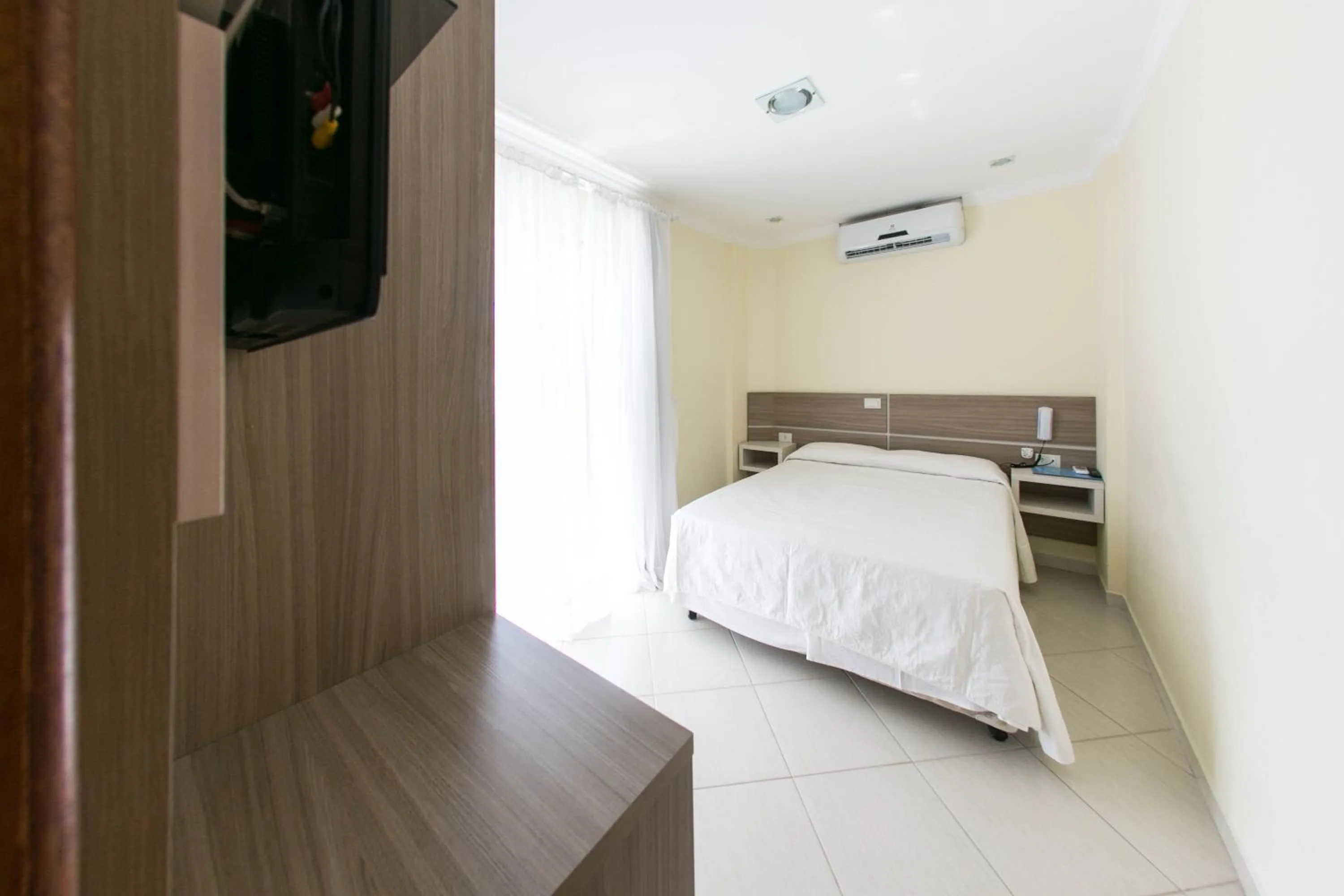 Bed in Bombinhas Praia Apart Hotel - Unidade rua Corrupião