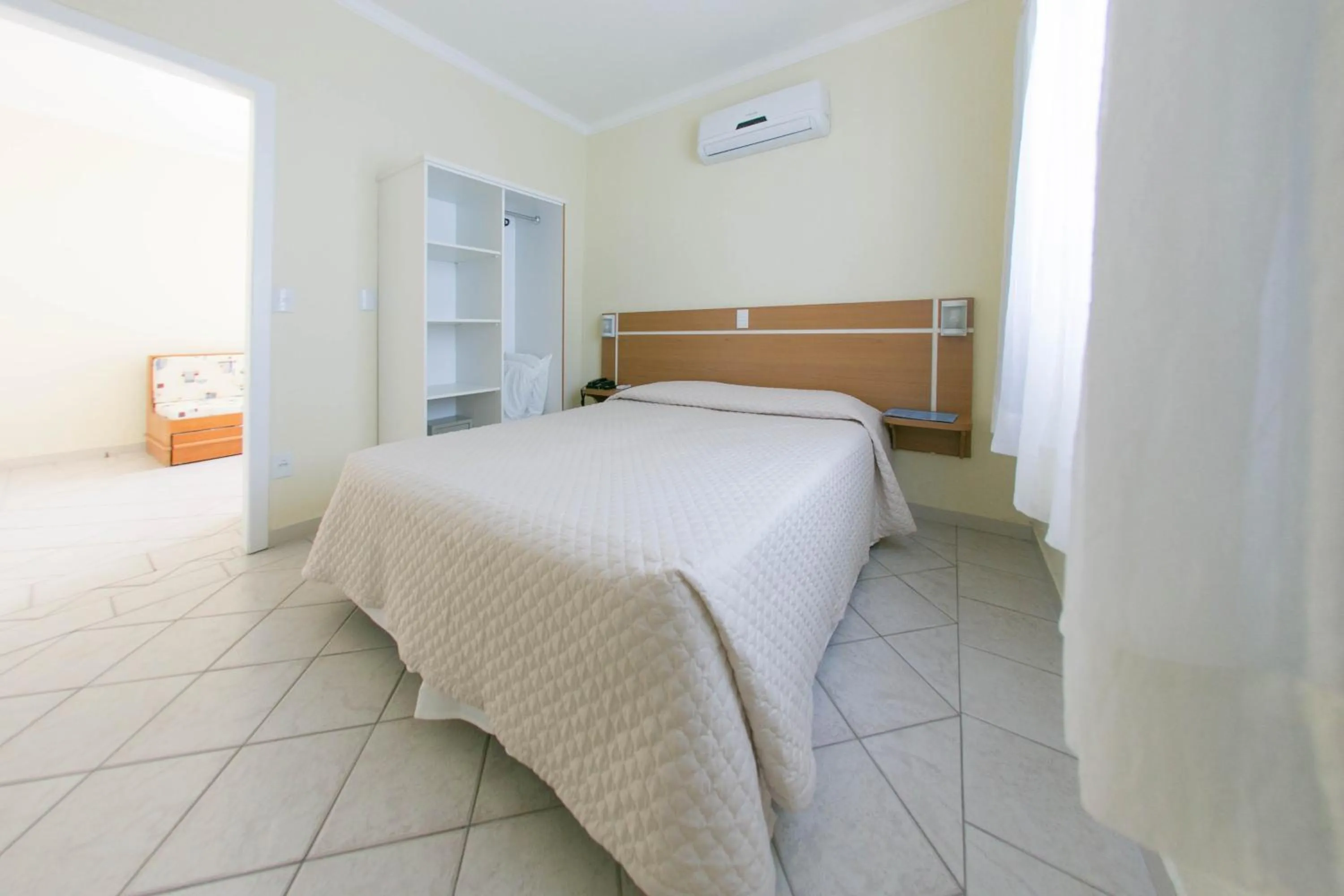 Bed in Bombinhas Praia Apart Hotel - Unidade rua Corrupião