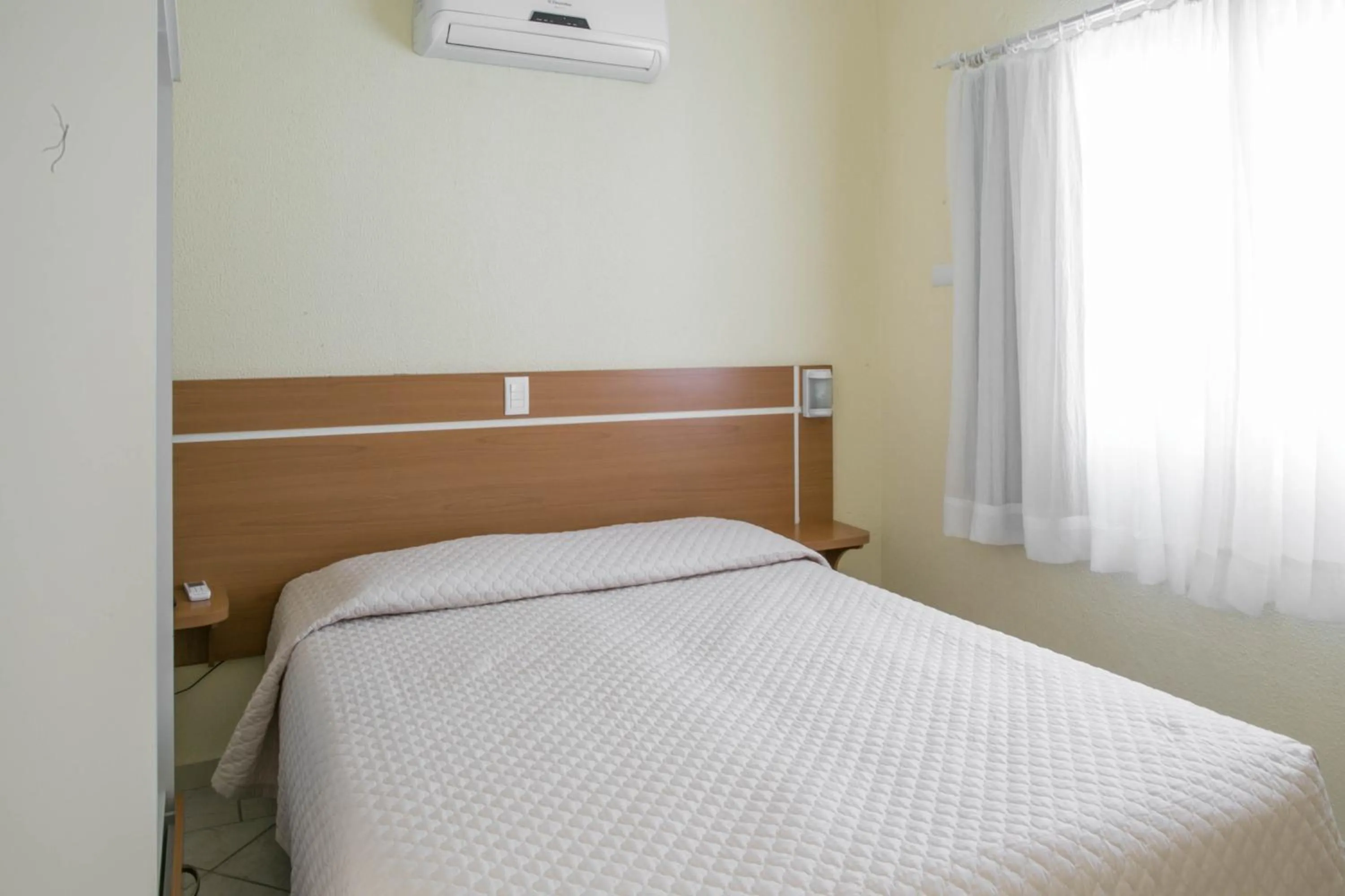 Bed in Bombinhas Praia Apart Hotel - Unidade rua Corrupião