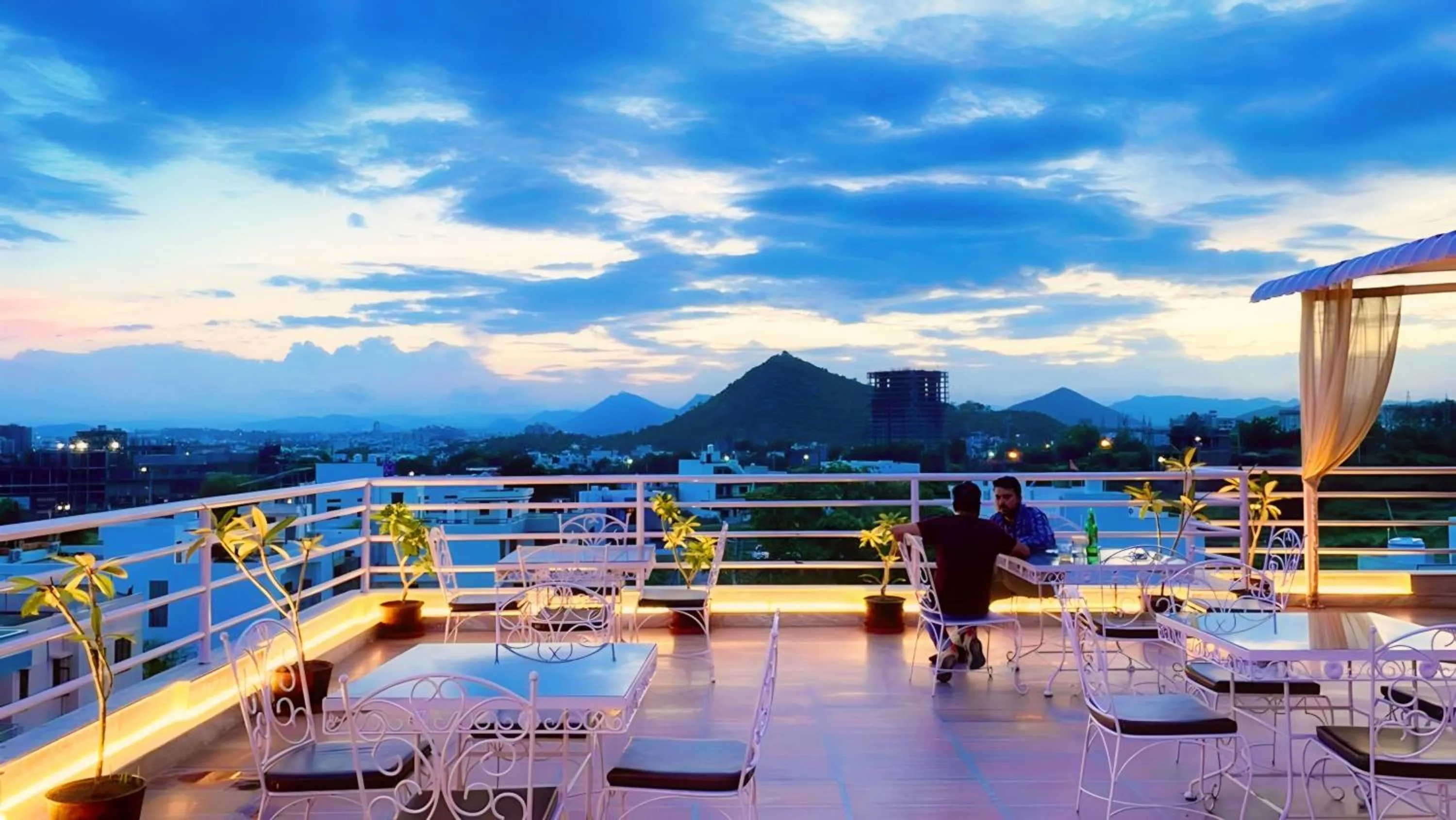 Restaurant/places to eat in HOTEL THE CELEBRATION BY AMOD Best Hotel & Rooftop