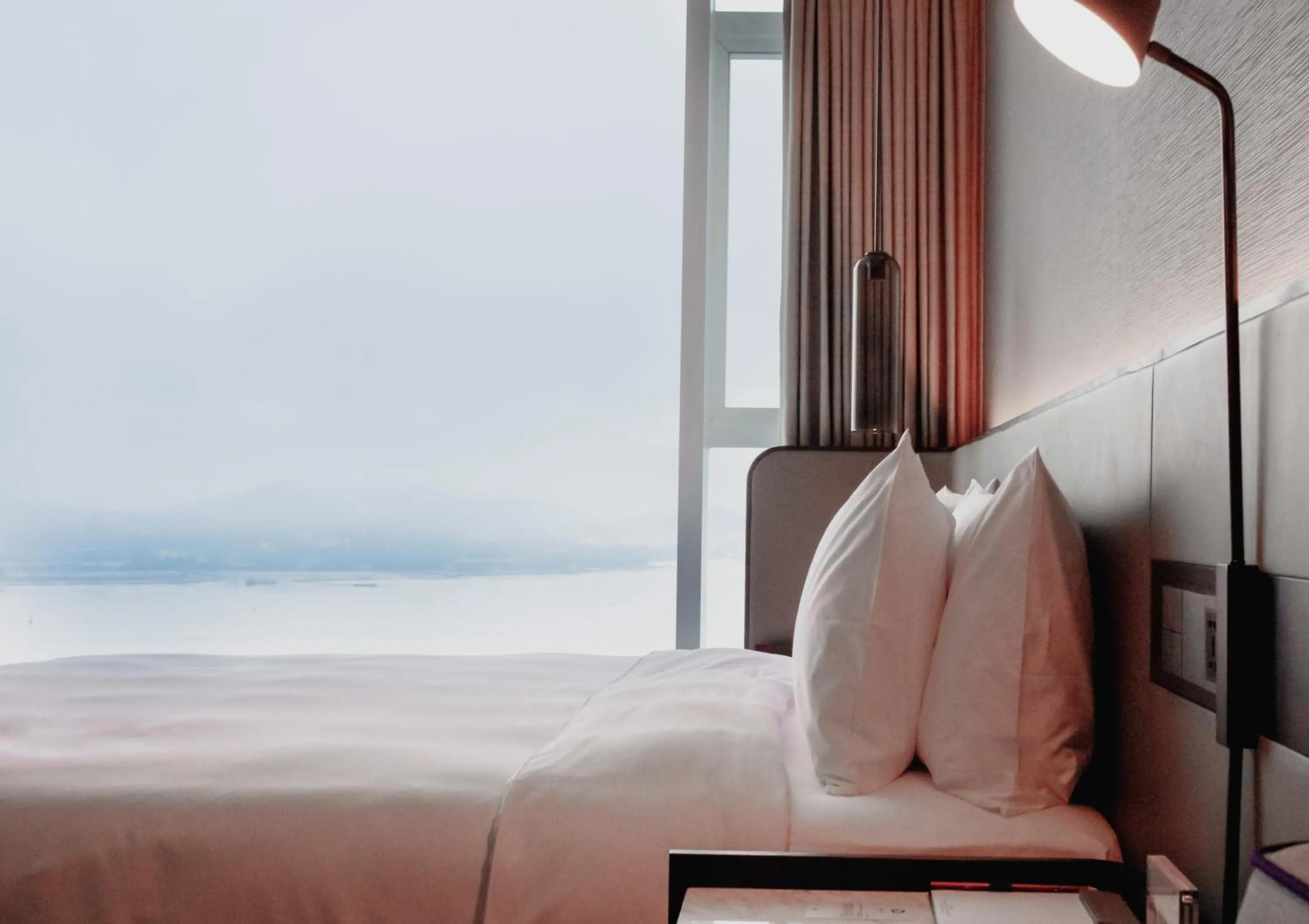 Bed in Crowne Plaza Xiamen Jimei Seaview by IHG-Free Mini Bar