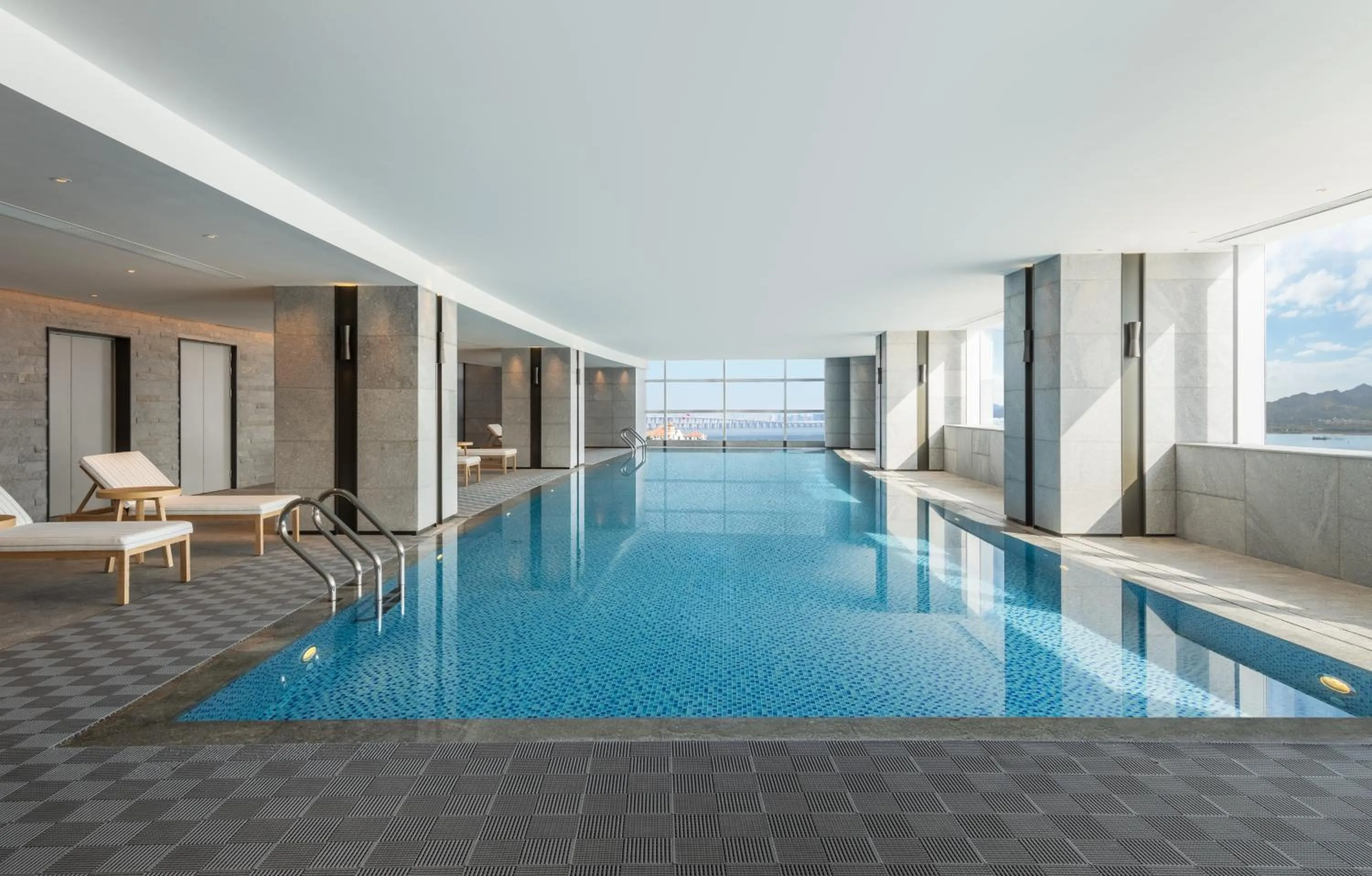 Swimming pool in Crowne Plaza Xiamen Jimei Seaview by IHG-Free Mini Bar