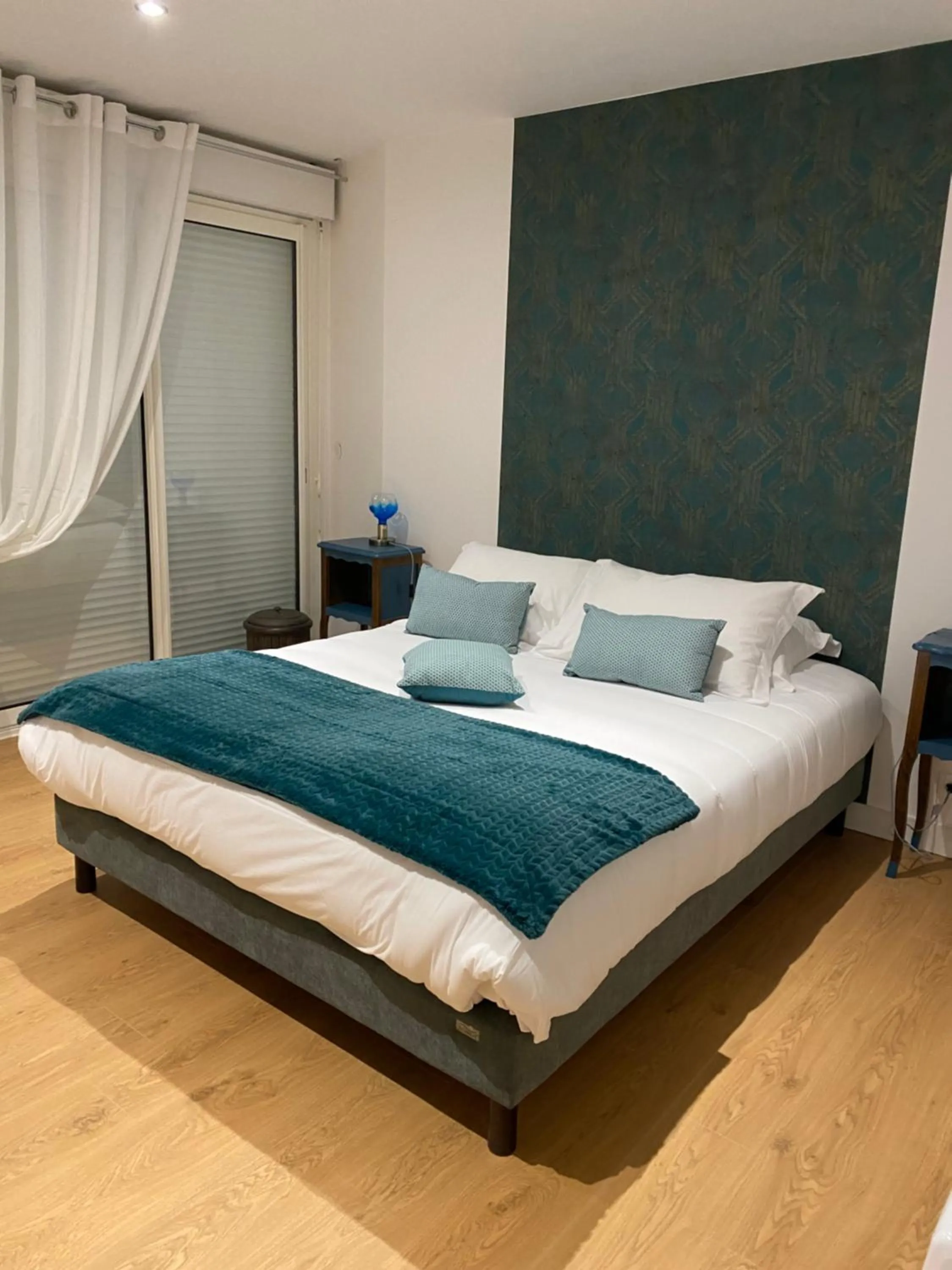 Bed in Le Rocher Appart Hôtel