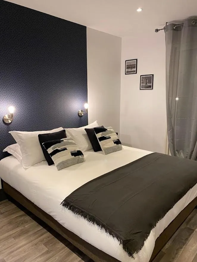 Bed in Le Rocher Appart Hôtel