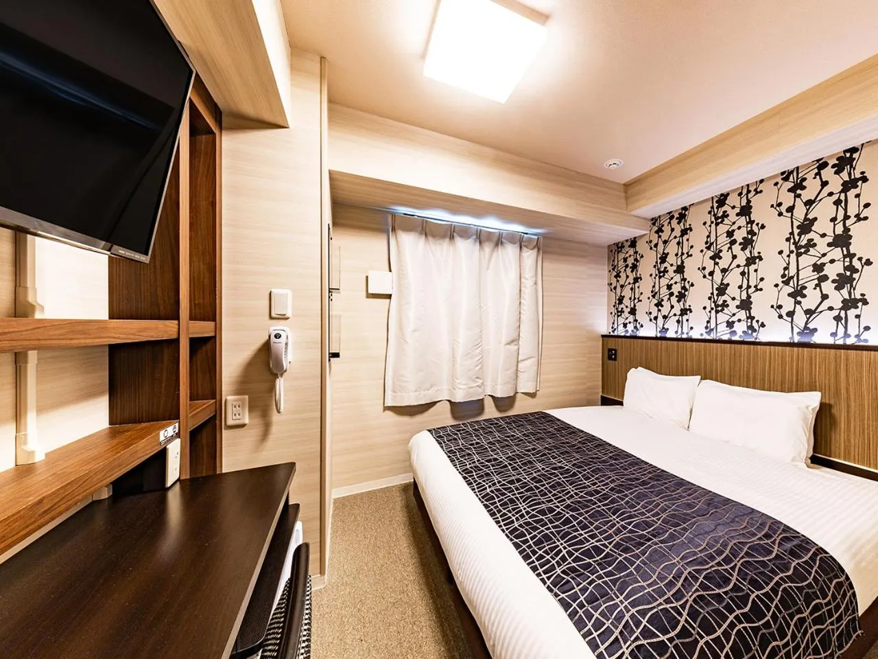 Photo of the whole room, Bed in APA Hotel Nambaminami Daikokucho Ekimae