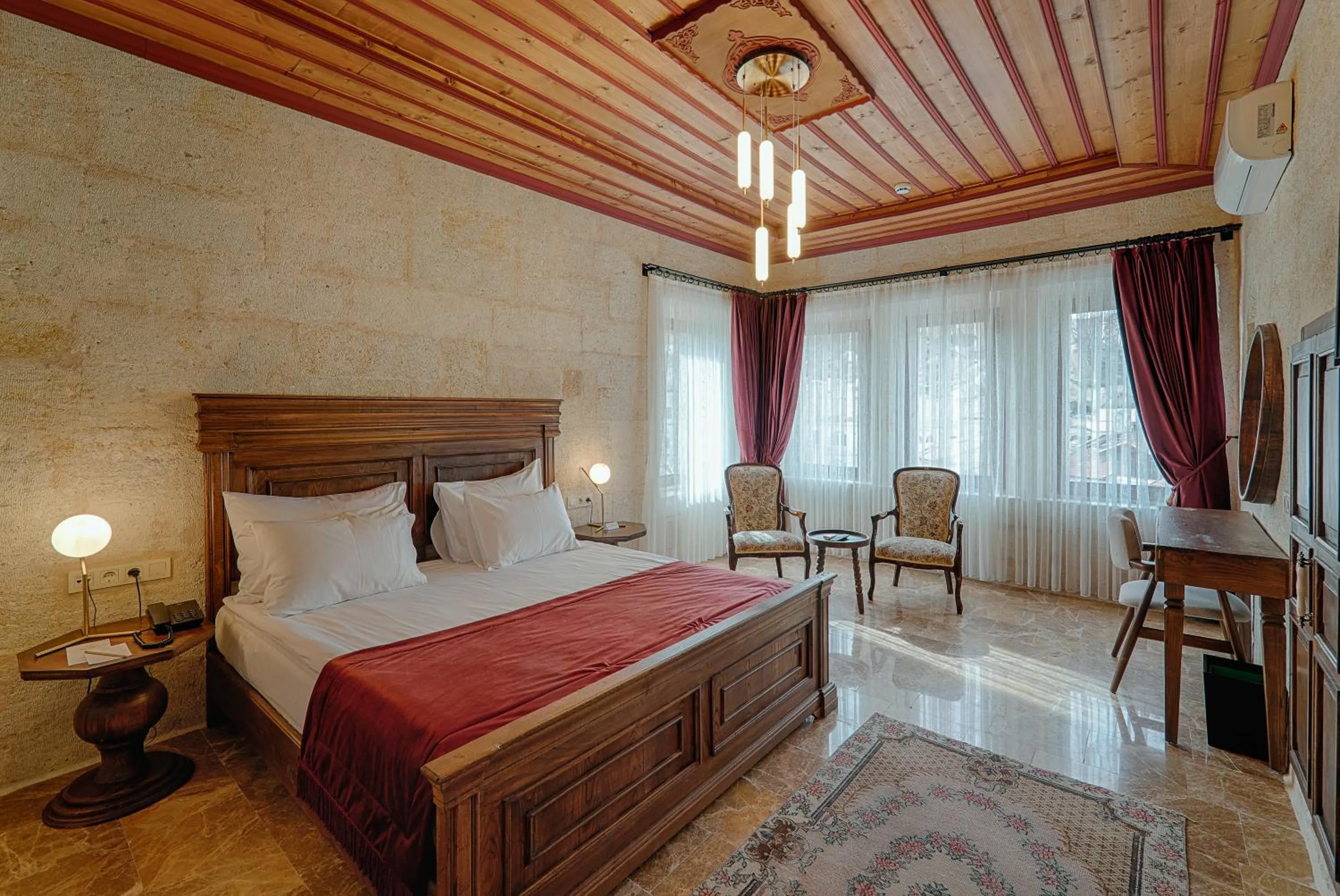 Bed in Solem Cave Suites