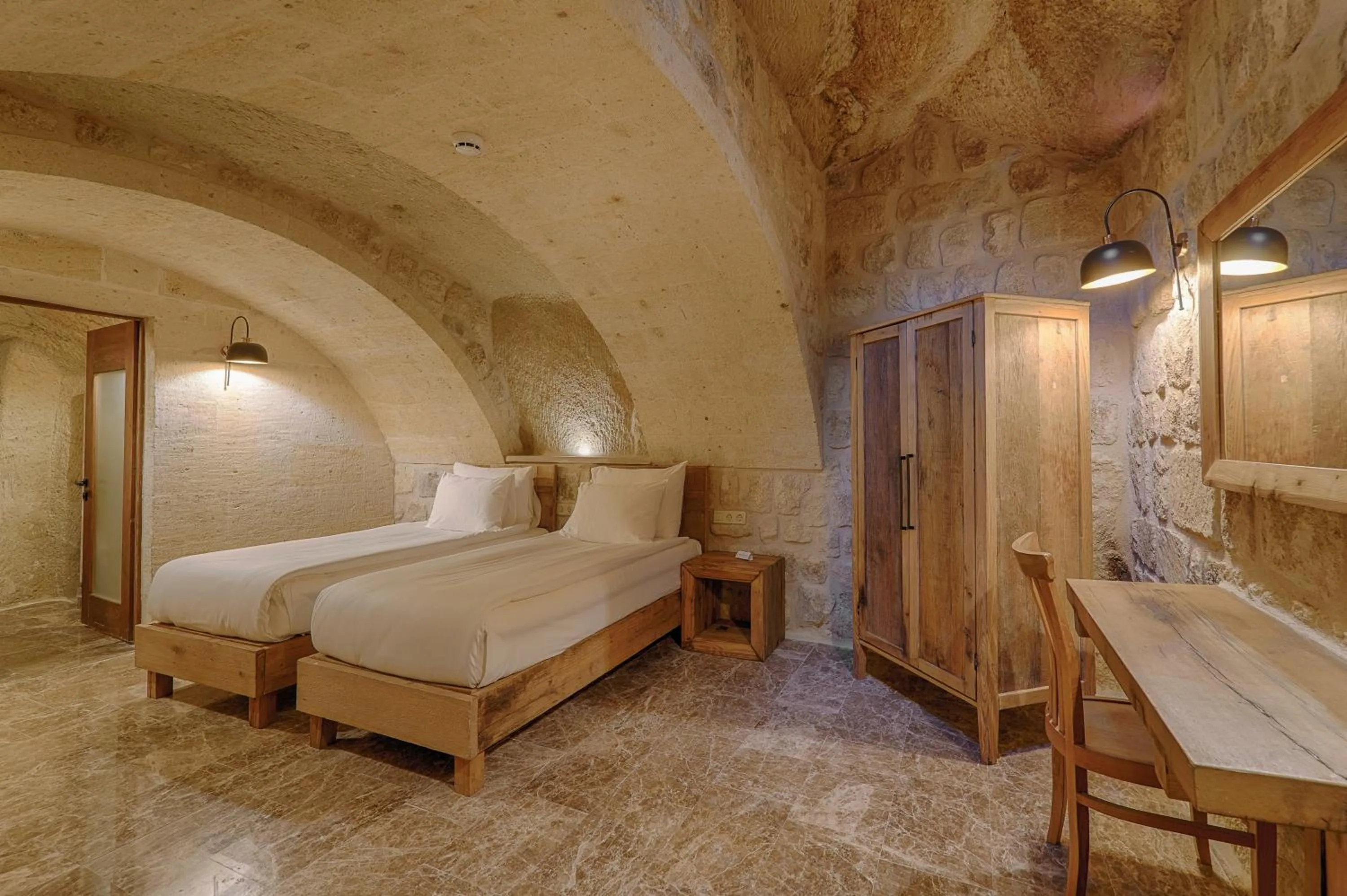 Bed in Solem Cave Suites