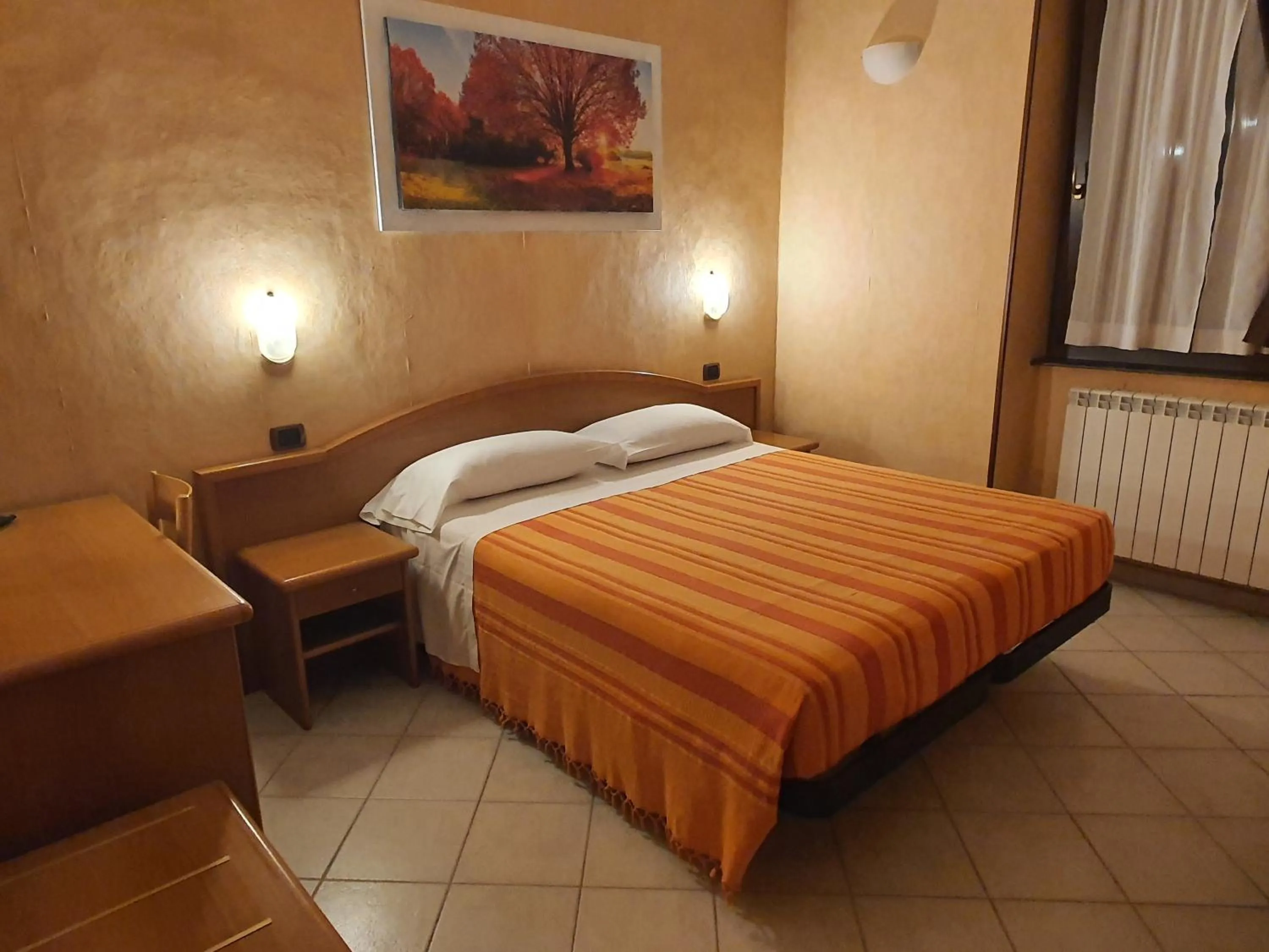 Bed in Hotel Isolabella