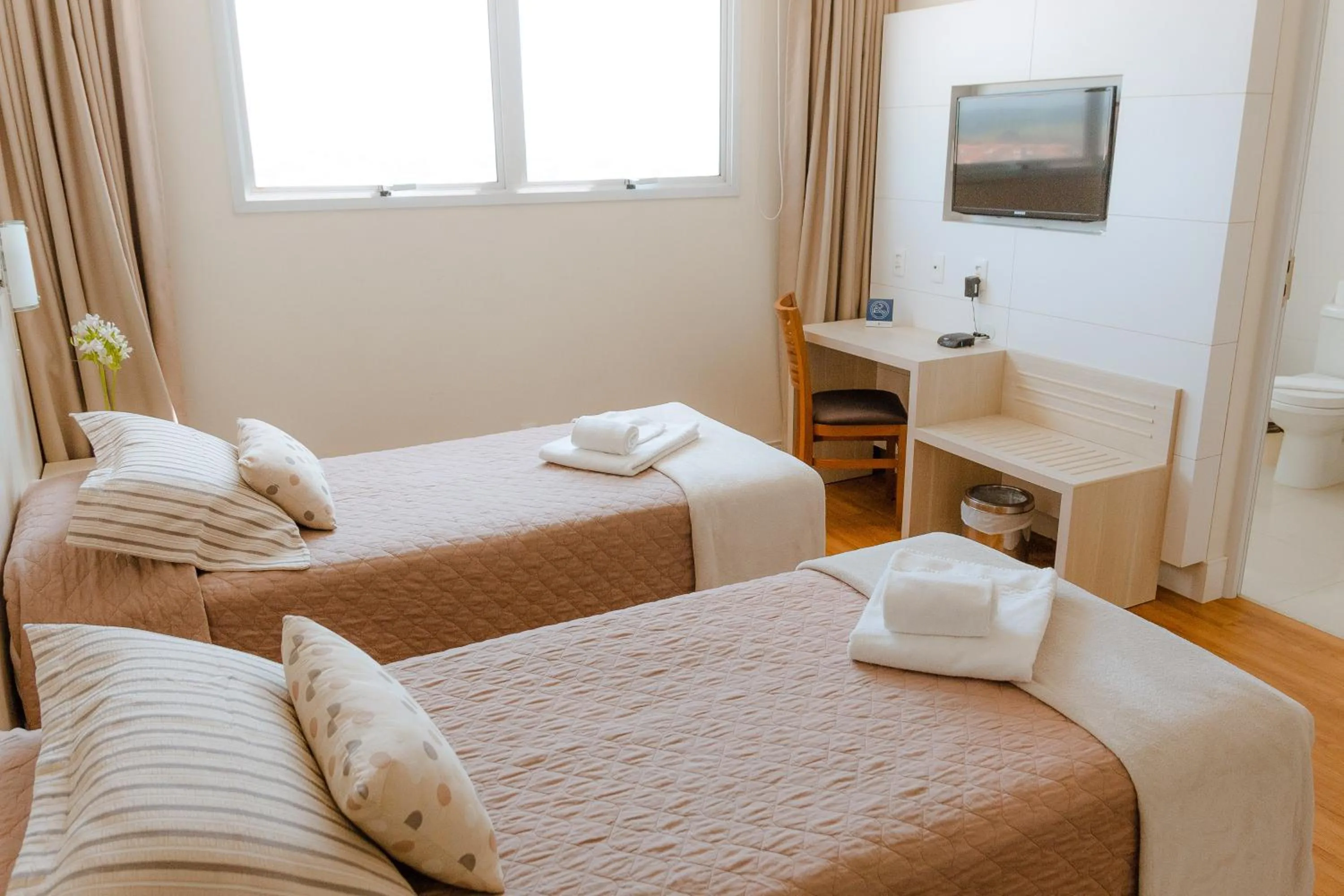 Bed in Porto Feliz Executive Hotel