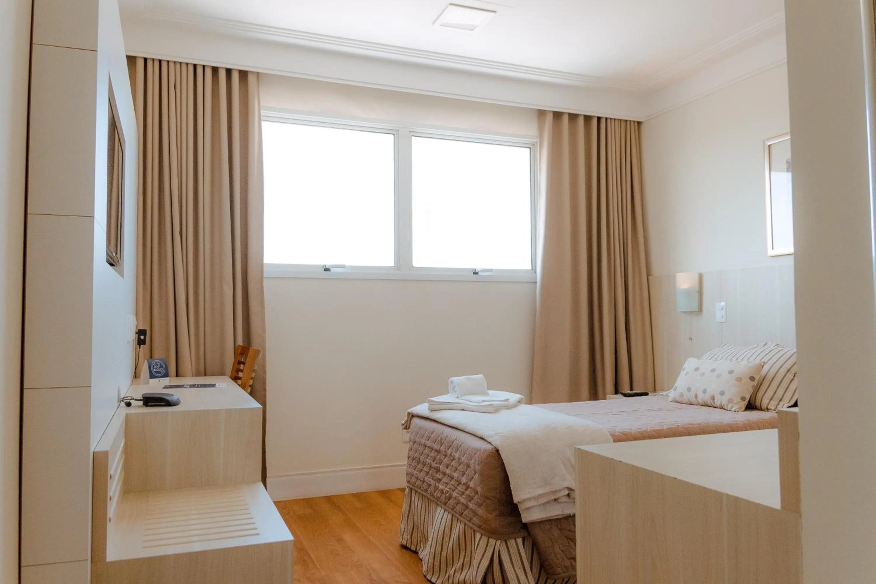 Bed in Porto Feliz Executive Hotel