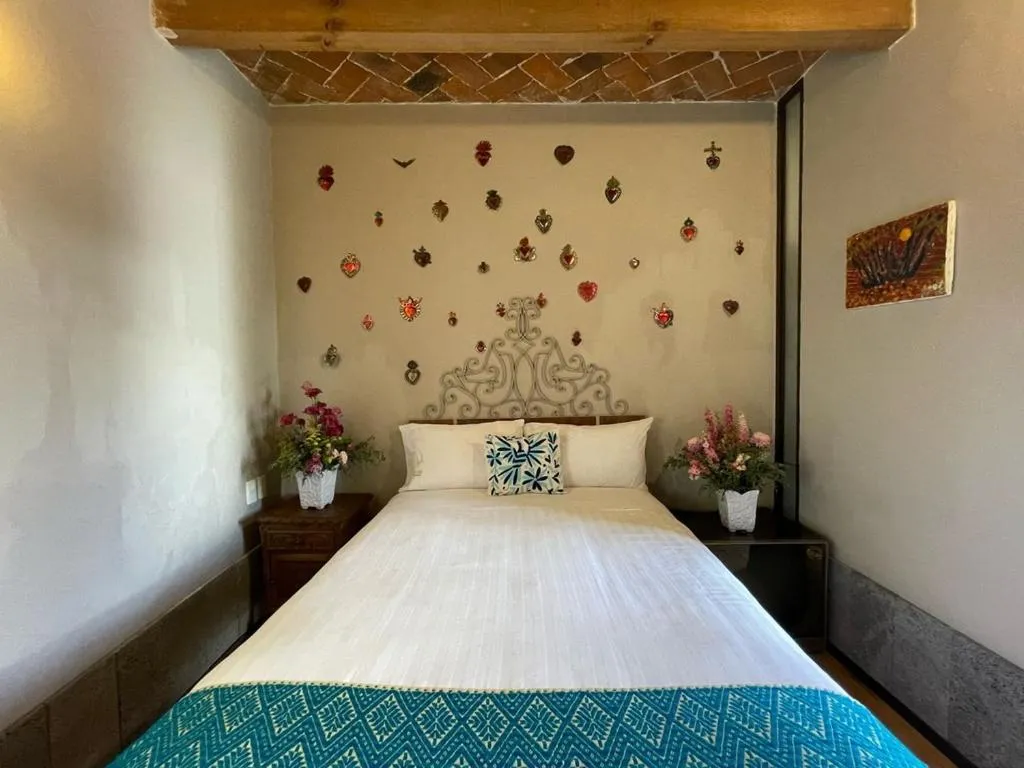 Bed in Posada Colibri - Hotel & Spa
