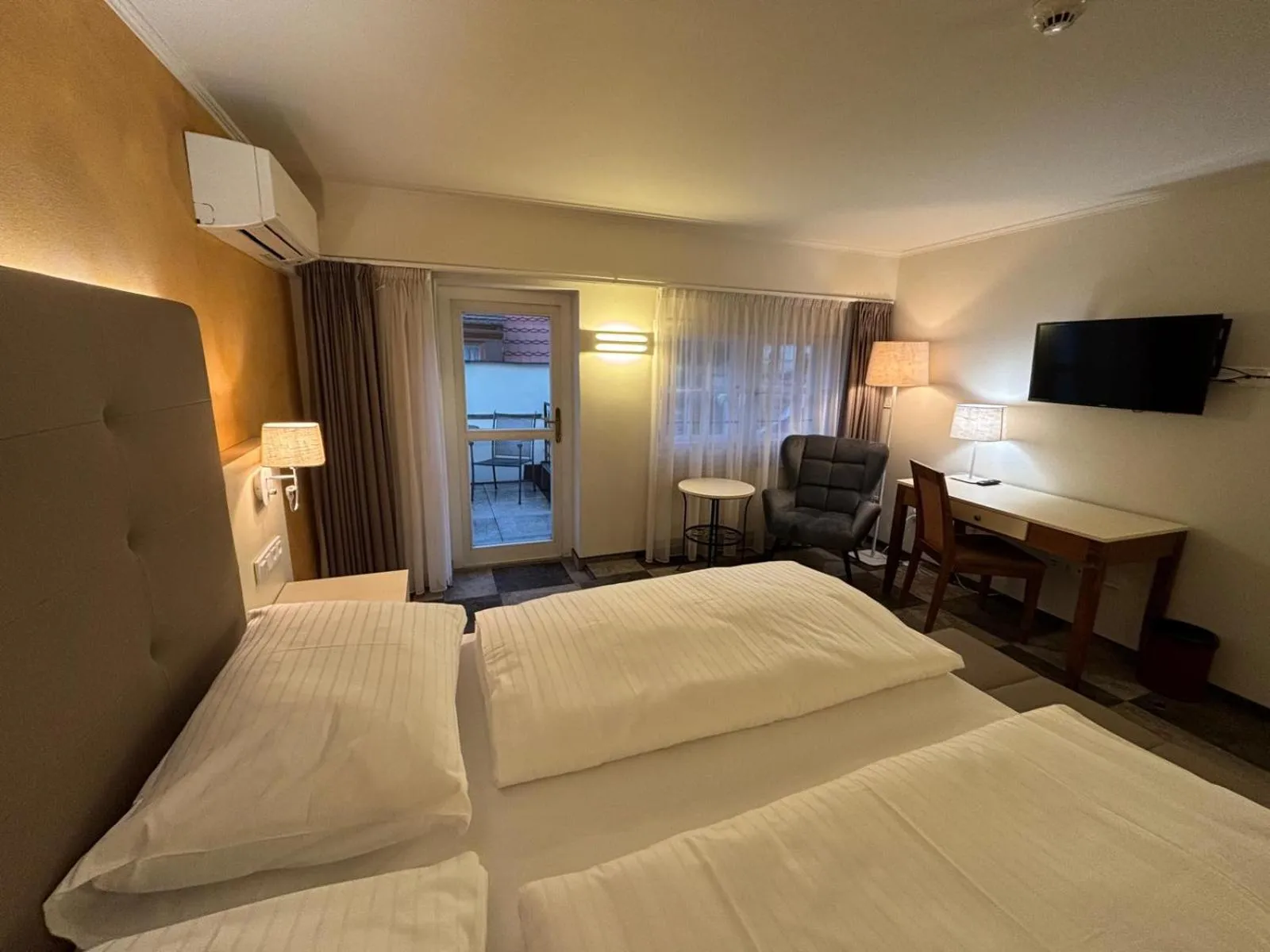 Photo of the whole room, Bed in The Golden Wheel Hotel