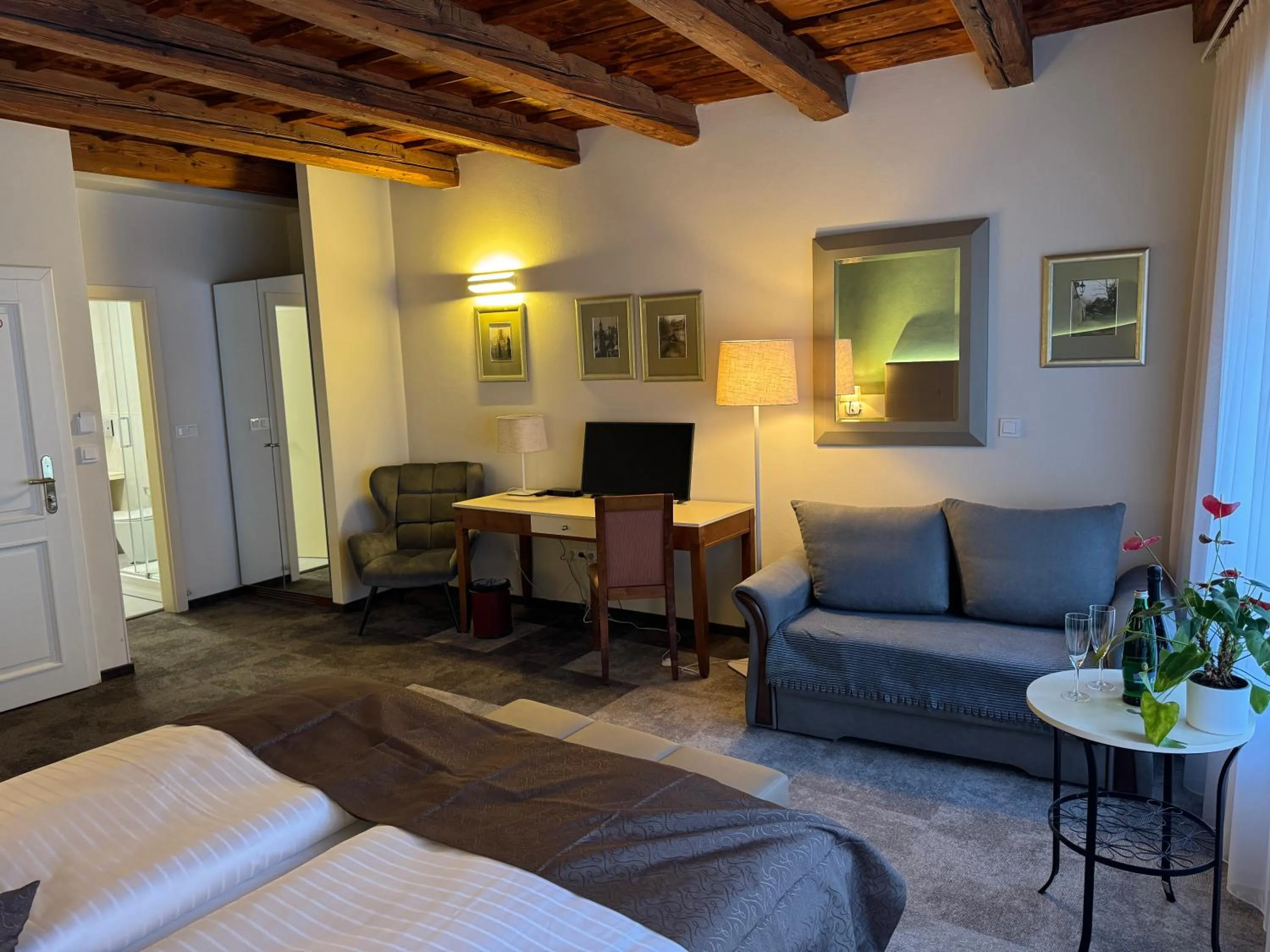 Bed in The Golden Wheel Hotel