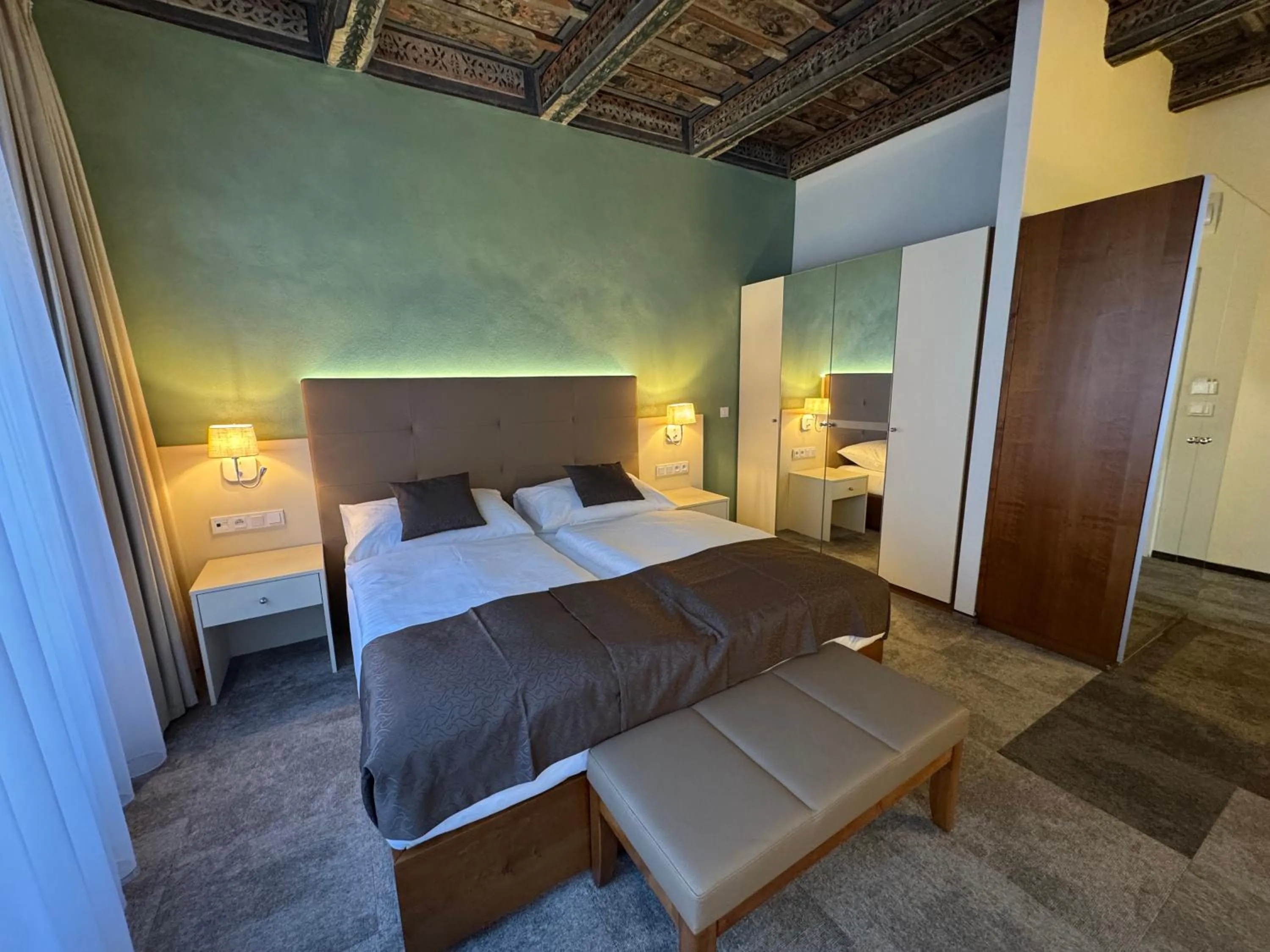 Photo of the whole room, Bed in The Golden Wheel Hotel