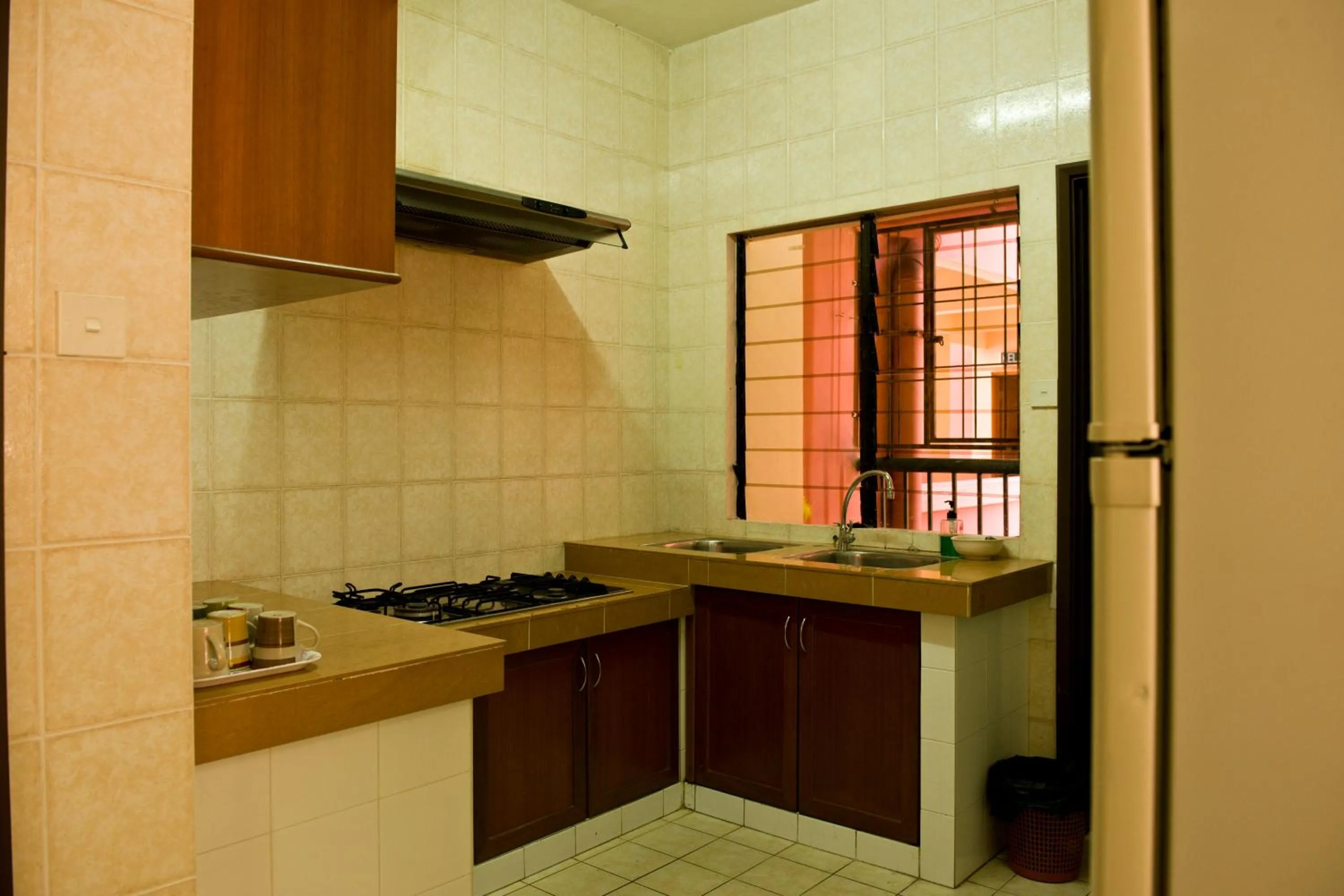 Kitchen or kitchenette in Nana Marina Court