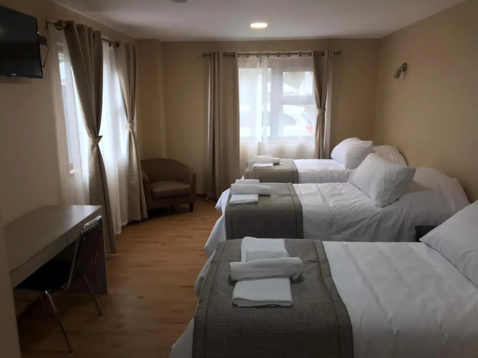 Triple Room in Gran Hotel Aysen Triple Room in Gran Hotel Aysen