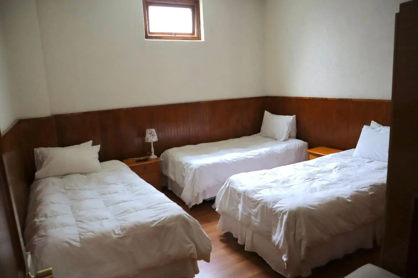 Bed in CHALET CHAPITAL Punta Arenas