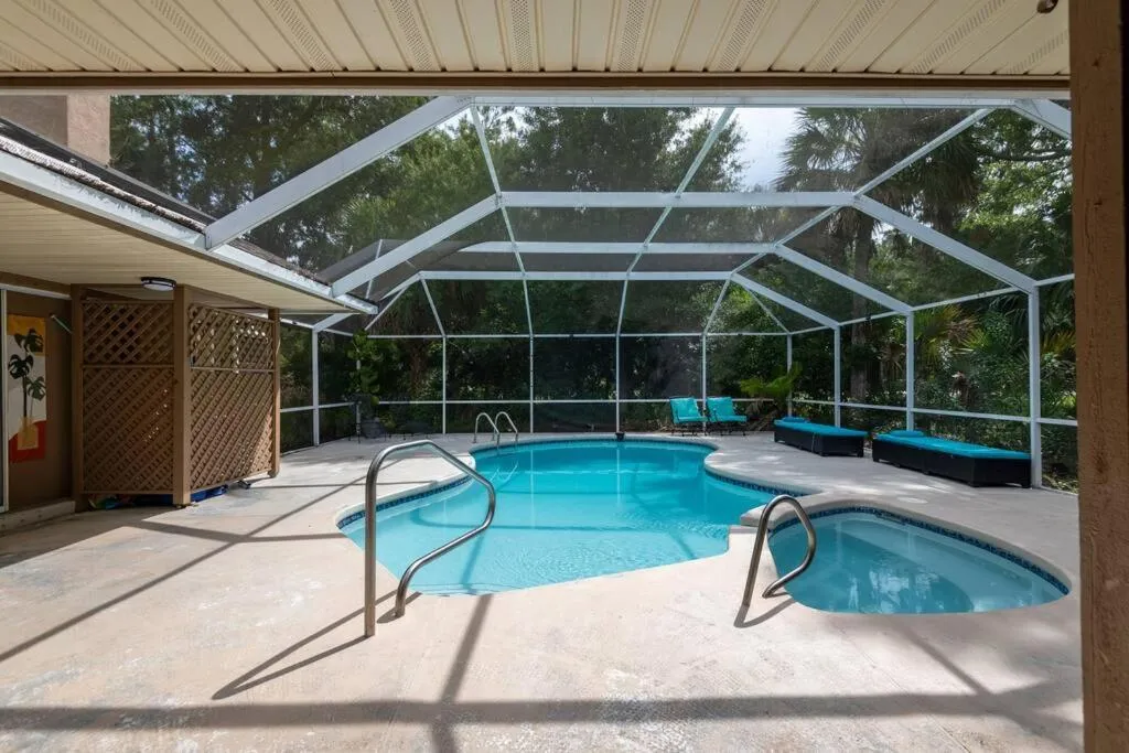 Tropical Escape with Relaxing Heated Pool & Palm Breezes