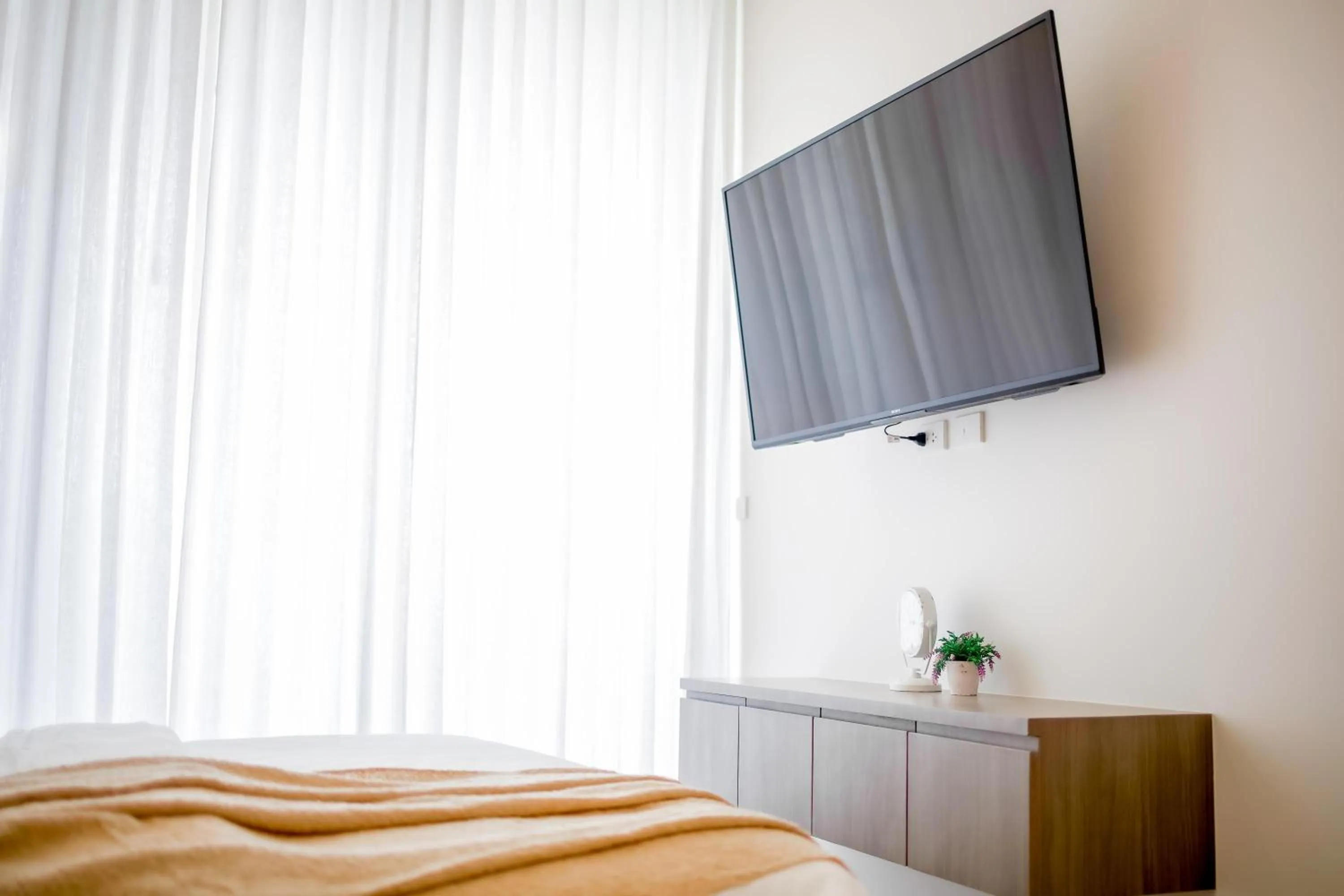 TV and multimedia, Bed in AKRA Collection Layan - Hideaway Villas