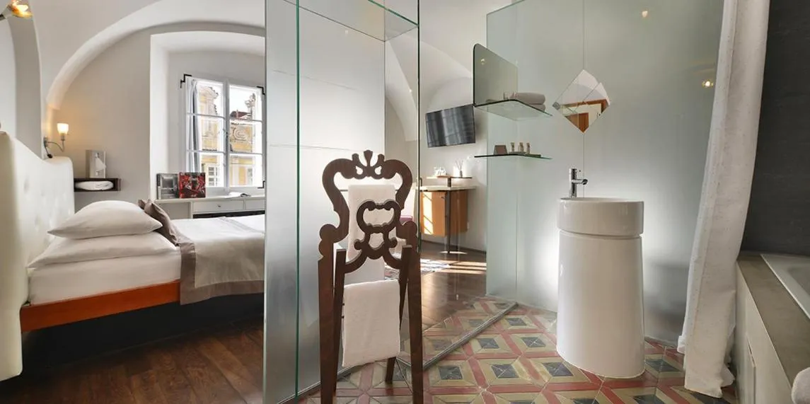 Bathroom, Bed in Design Hotel Neruda