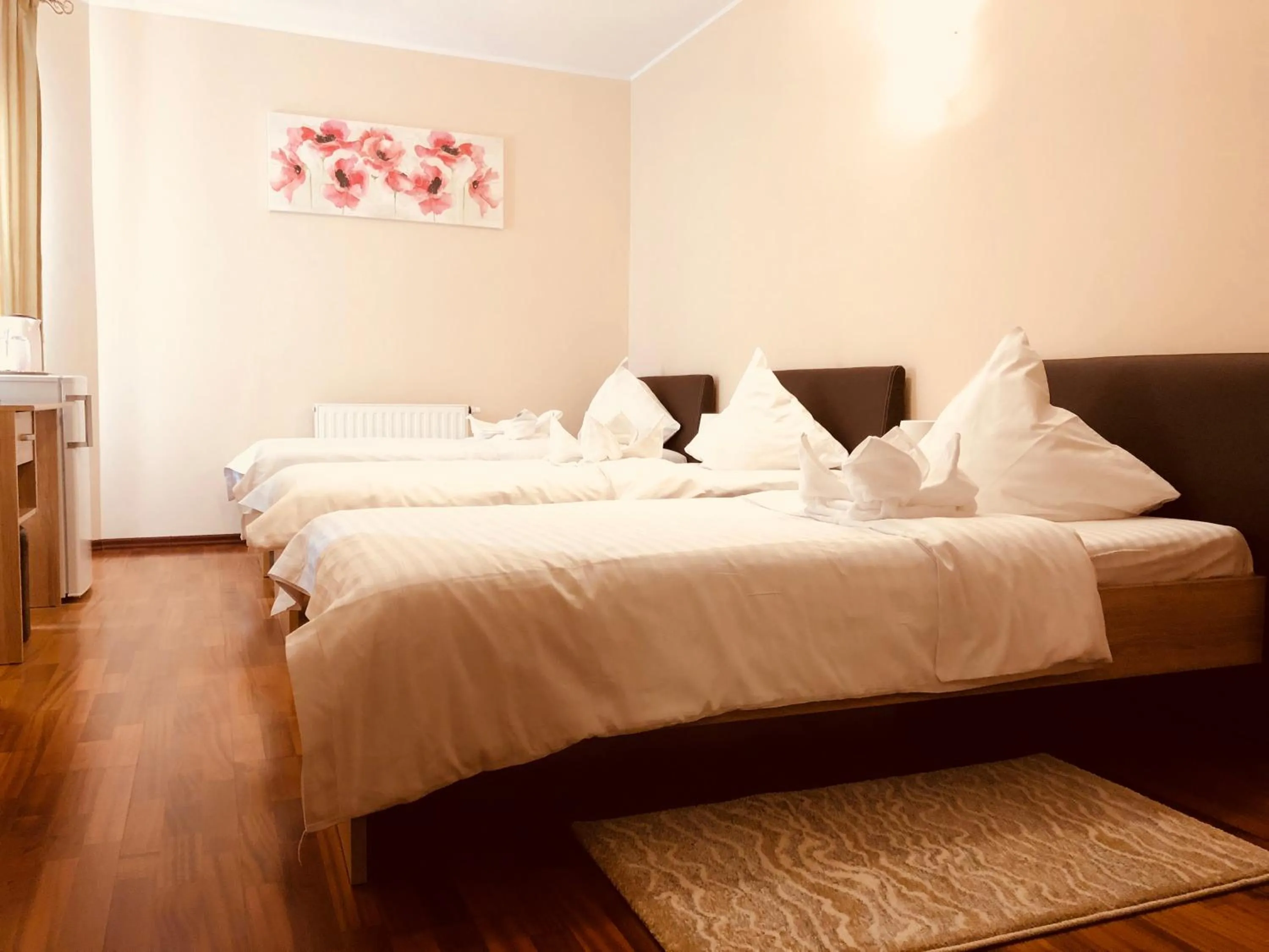 Bed in Monte Carlo Palace Rooms