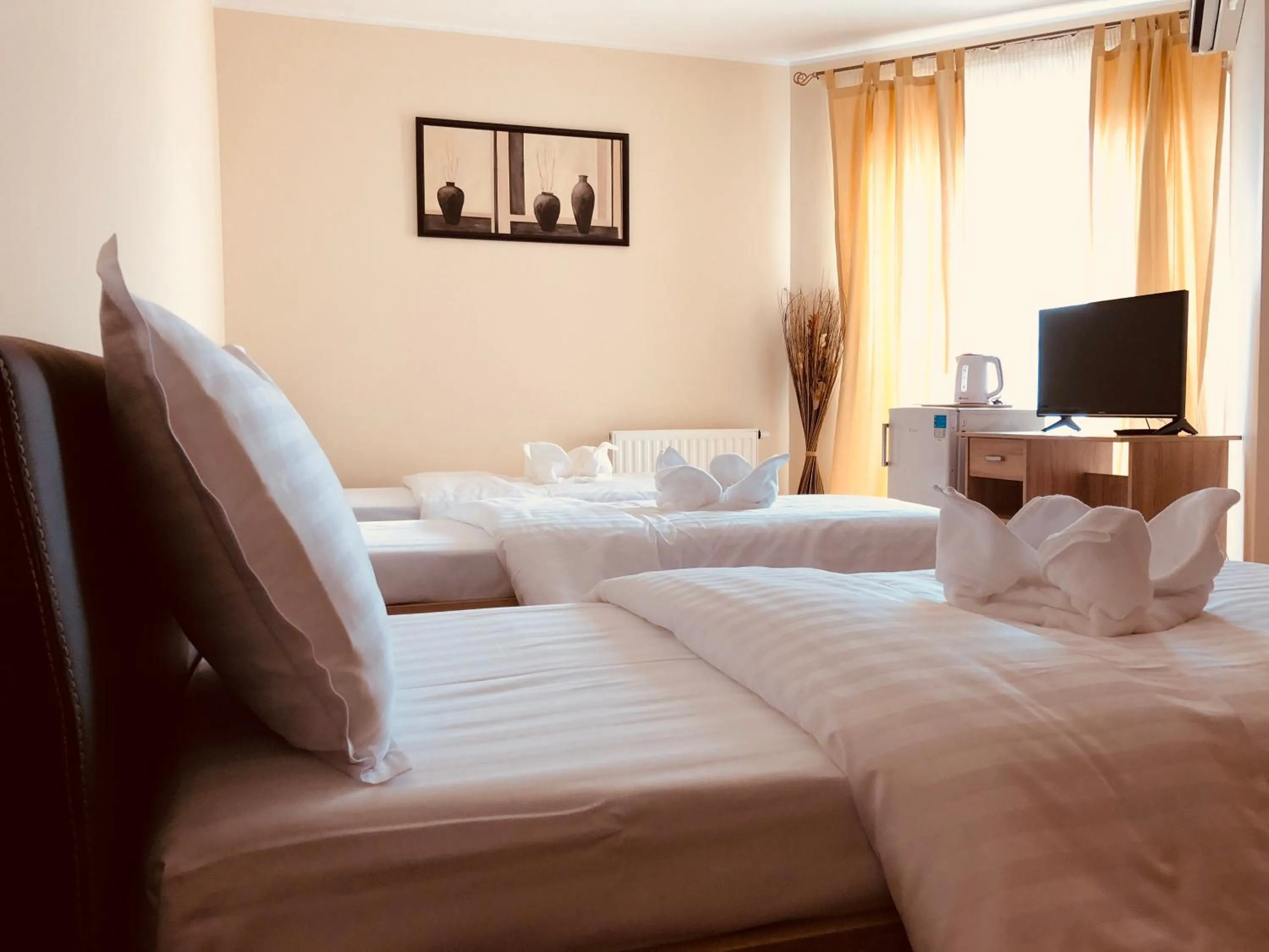 Bed in Monte Carlo Palace Rooms