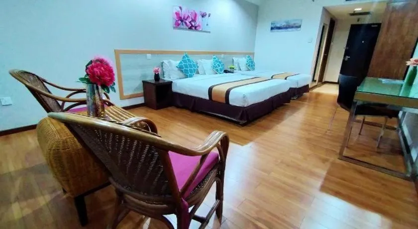 Bed in TD Plaza Hotel