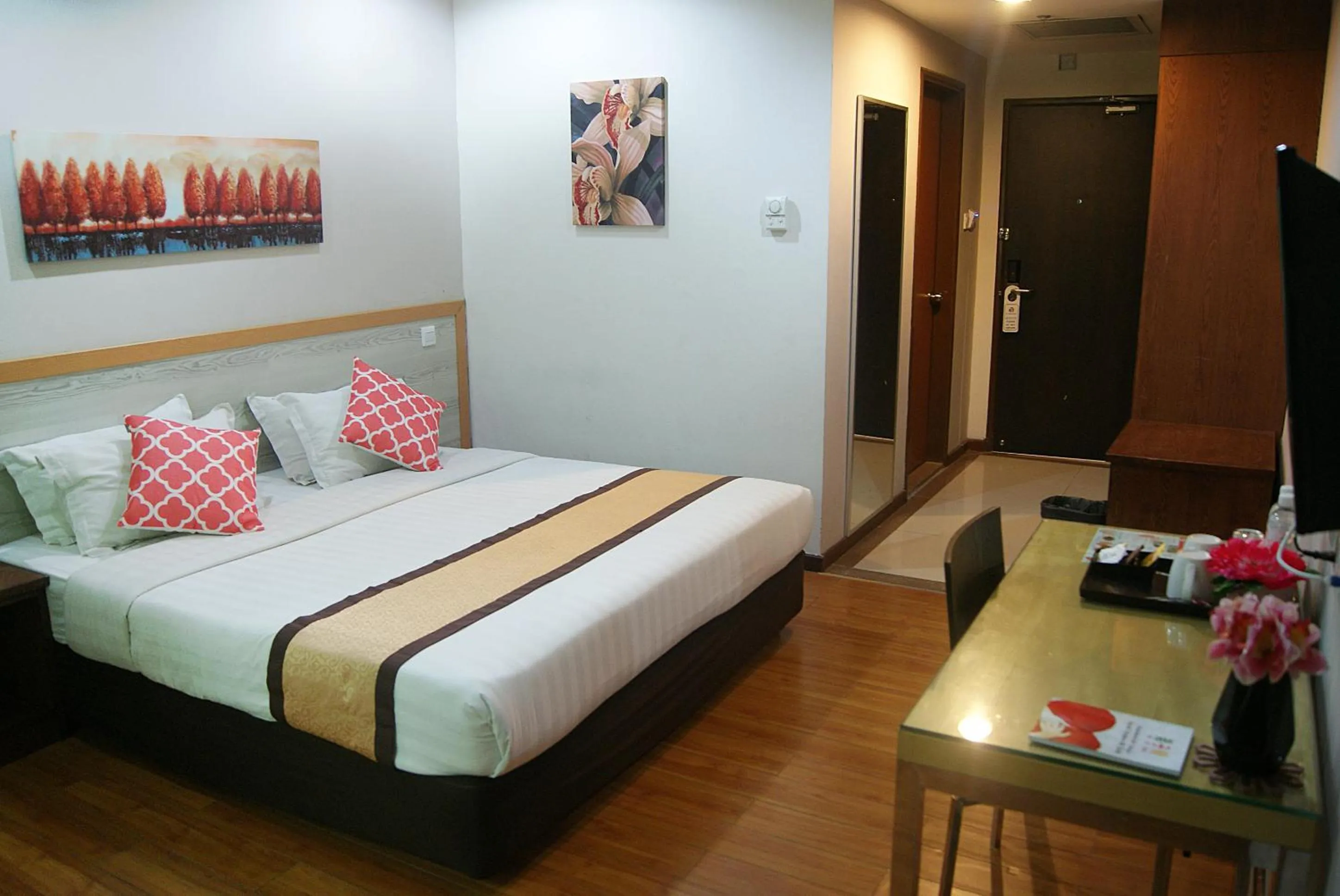 Photo of the whole room, Bed in TD Plaza Hotel