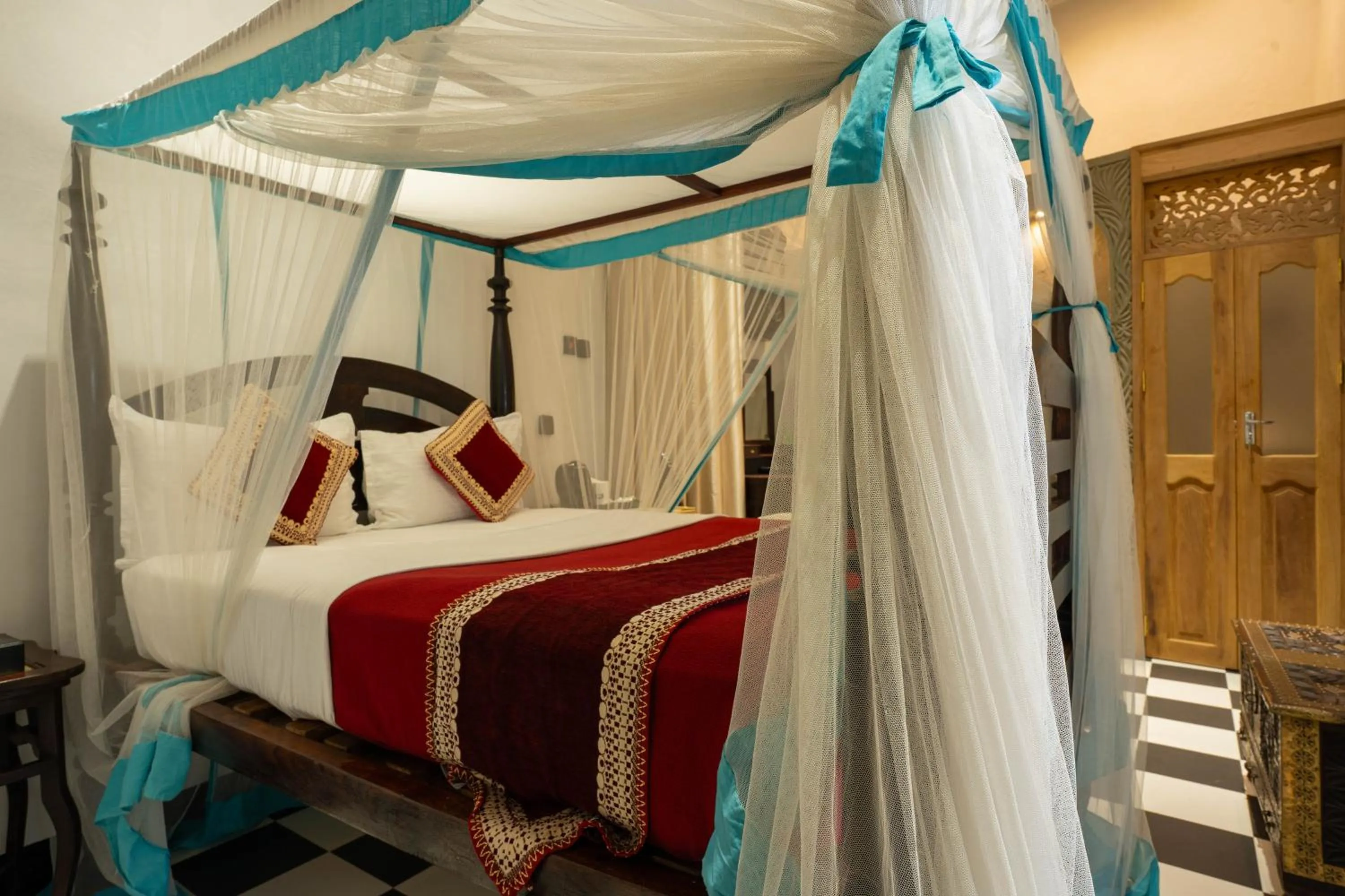 Bed in Dhow Palace Hotel