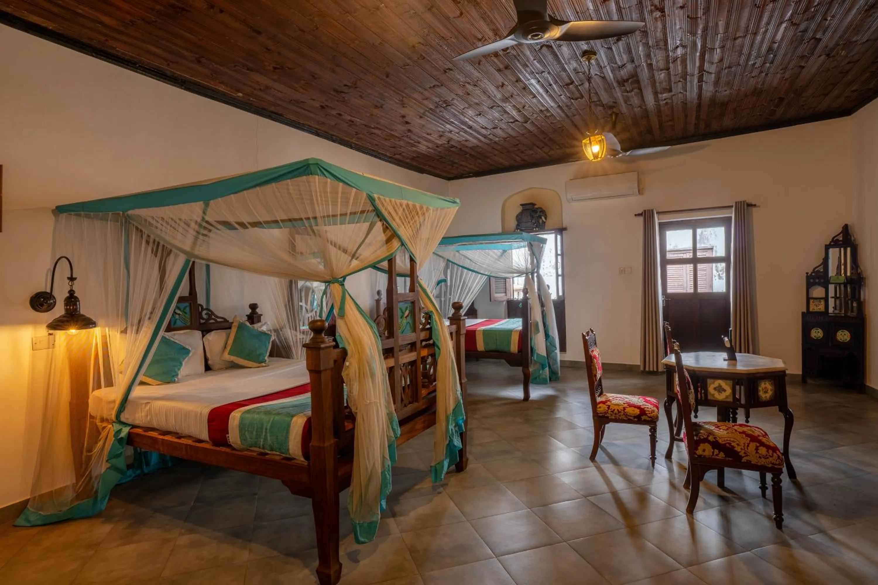 Bed in Dhow Palace Hotel