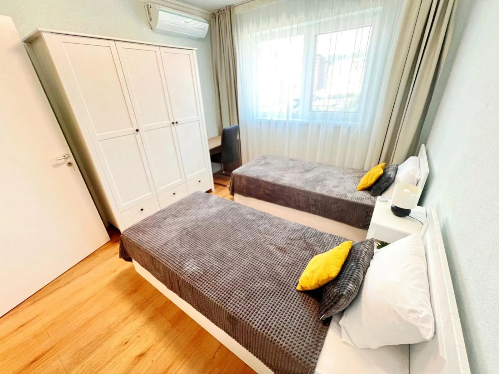 Bed in PAPAYA APARTMENTS