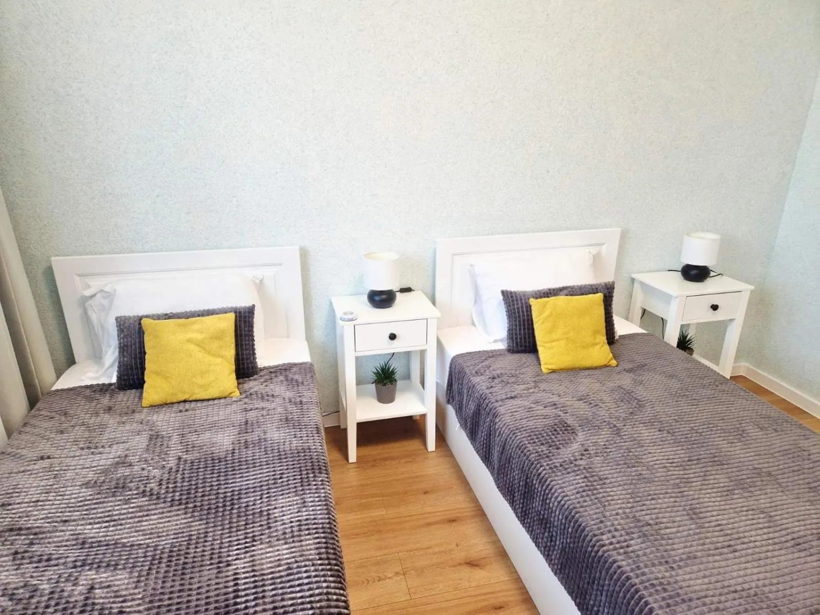 Bed in PAPAYA APARTMENTS