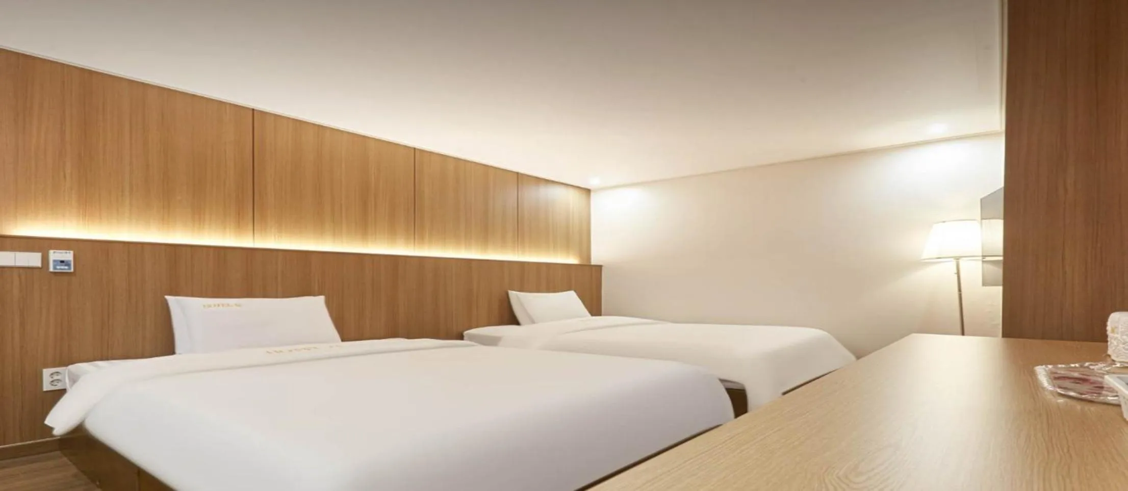 Bed in Hotel Q Chuncheon