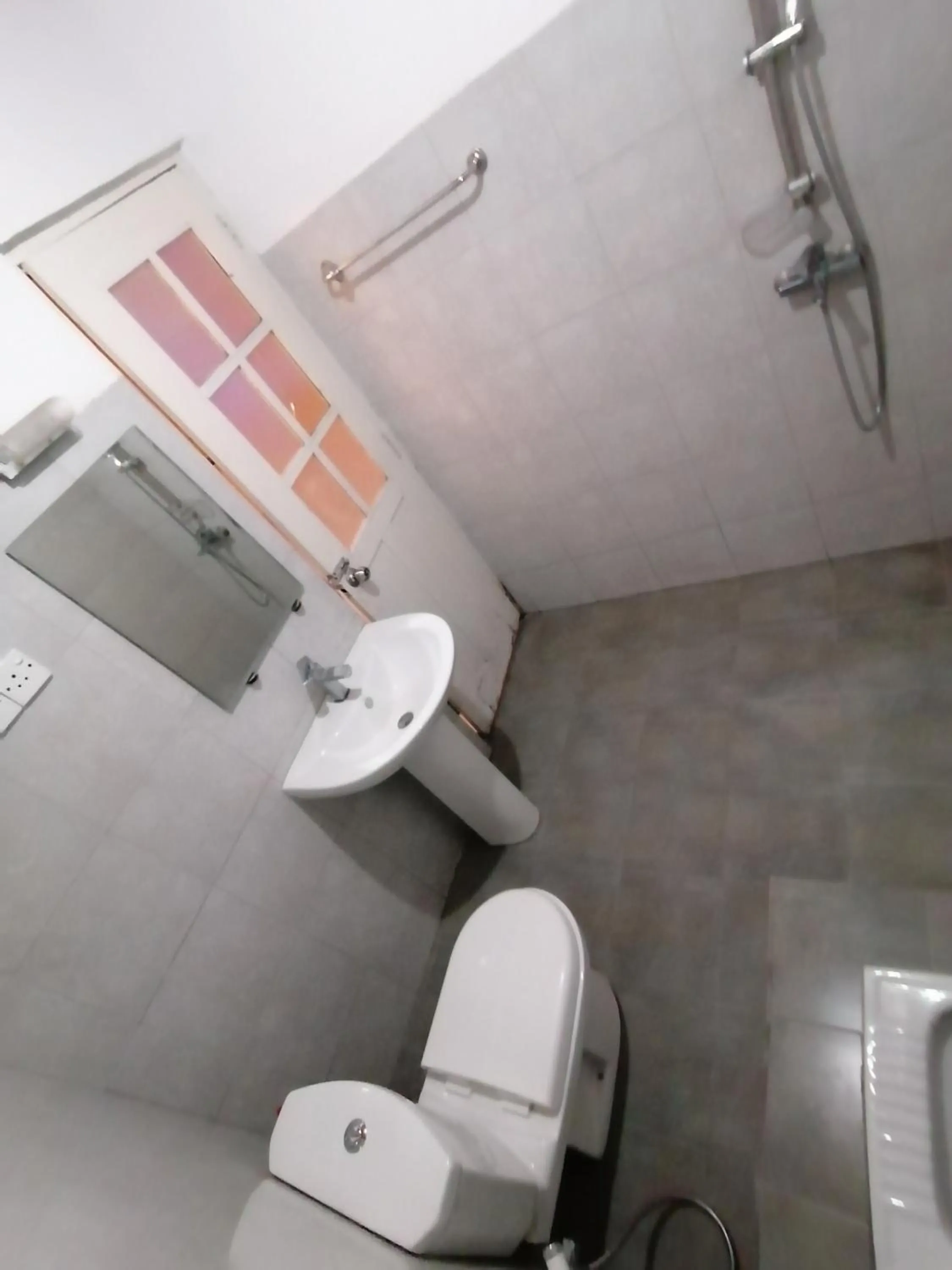 Toilet in Maha Royal Hotel