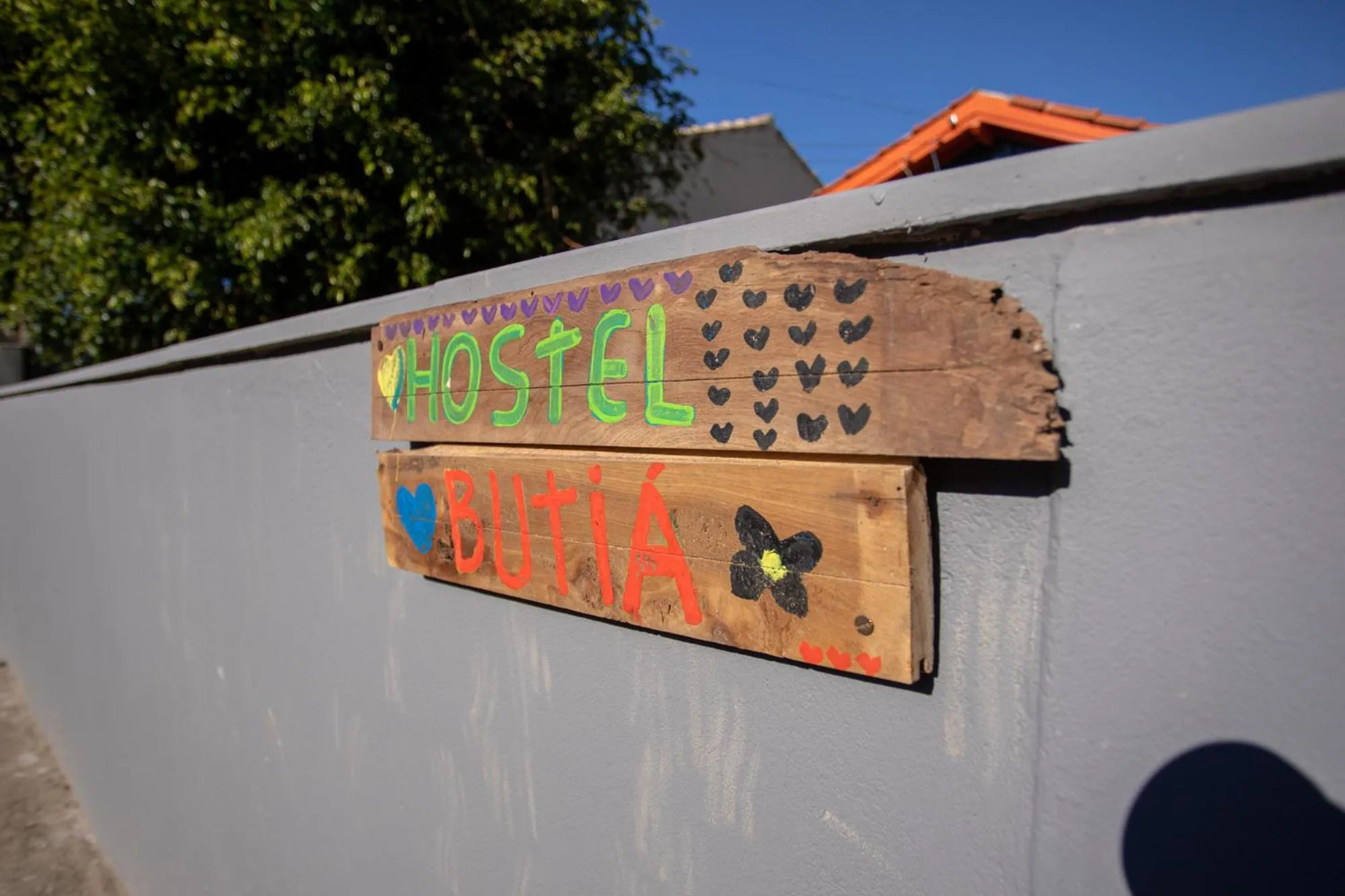 Property logo or sign in Hostel Butiá