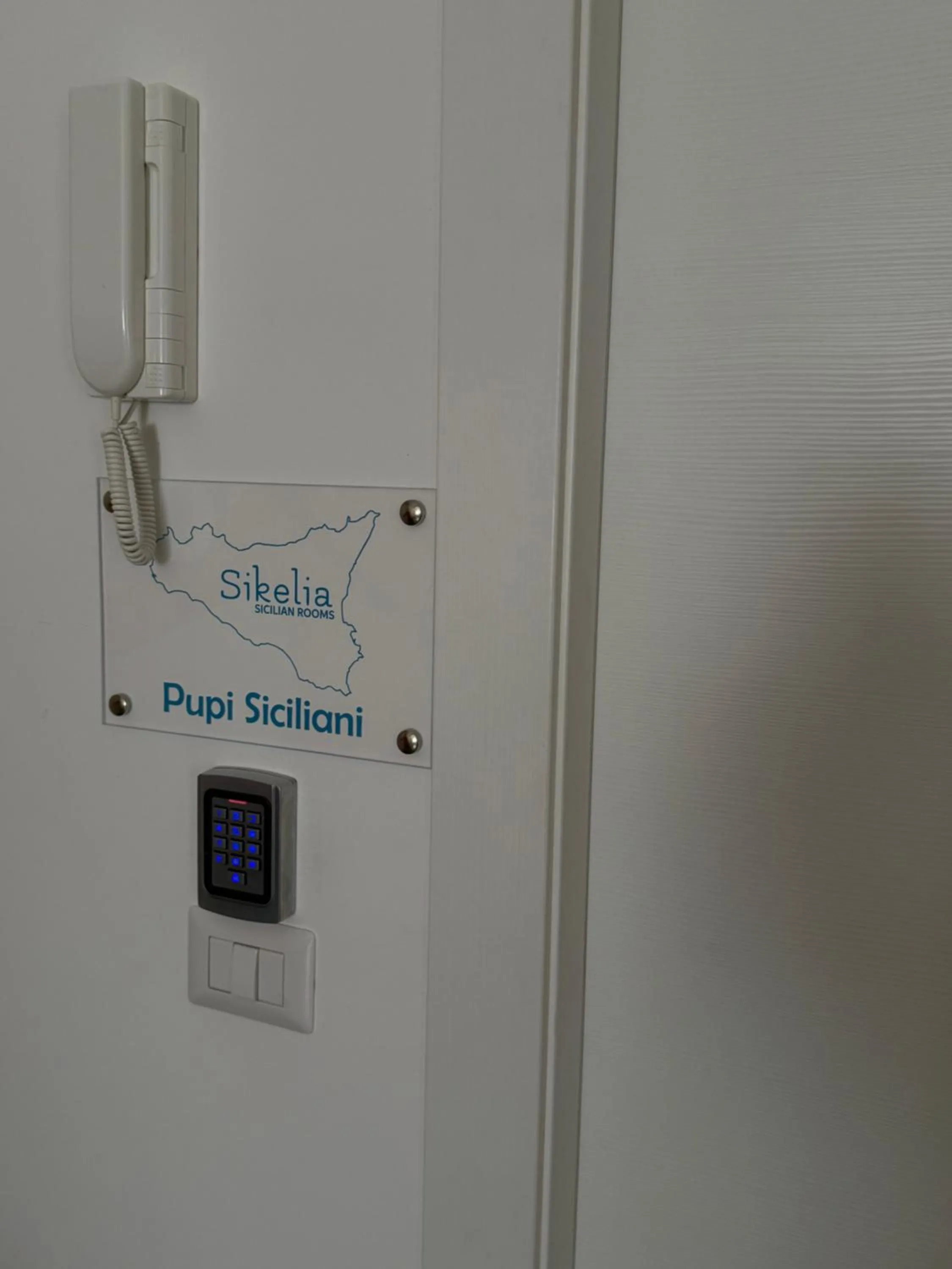 Property logo or sign in Sikelia-sicilian rooms