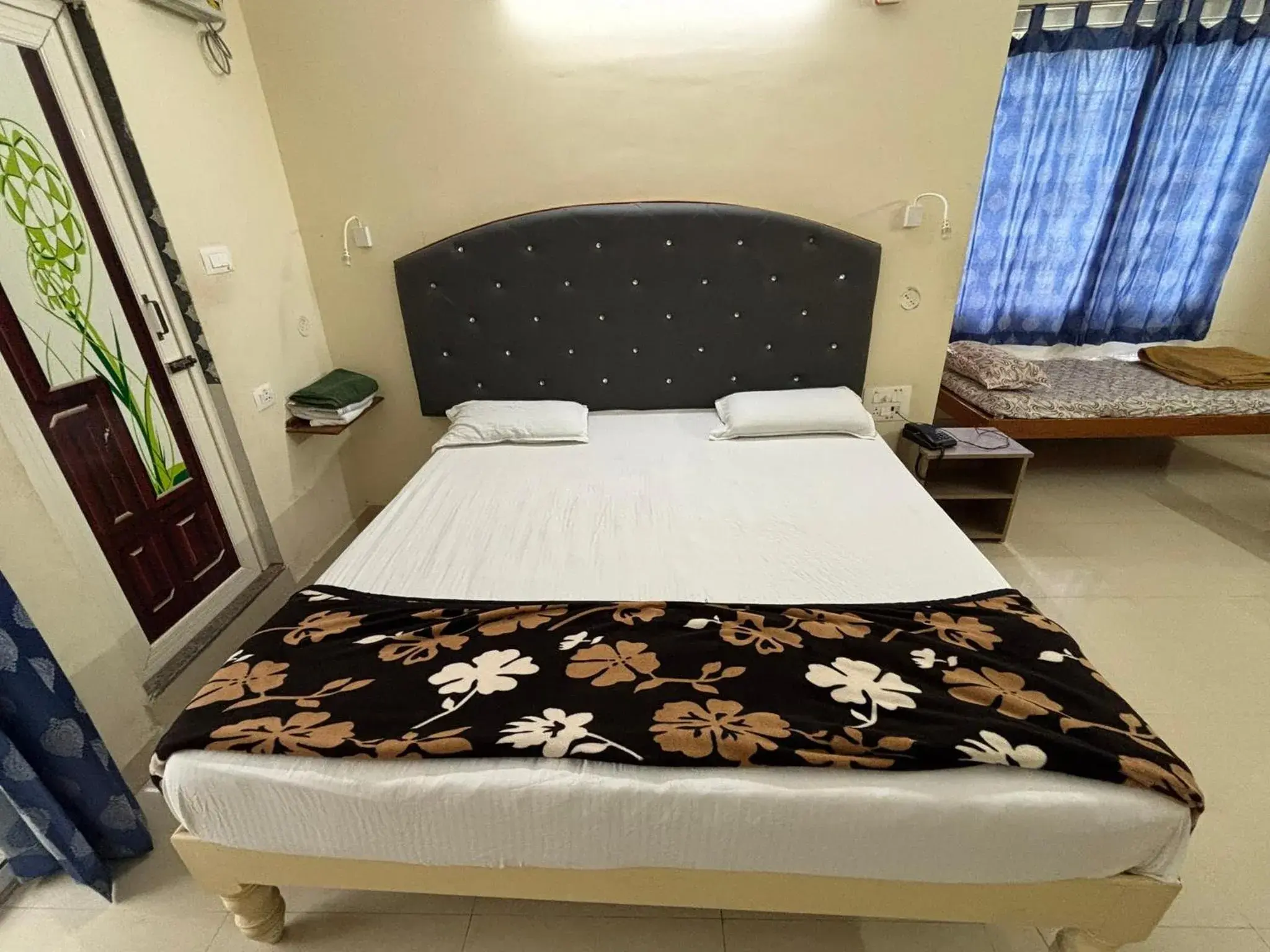 Bed in Srinivasa Hotel Bed in Srinivasa Hotel