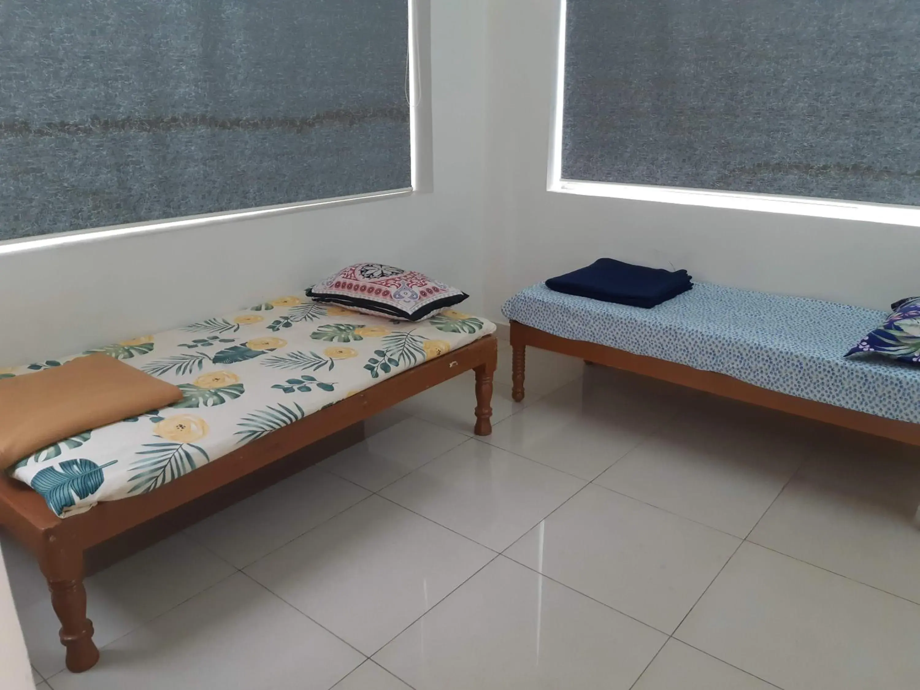 Bed in Srinivasa Hotel Bed in Srinivasa Hotel