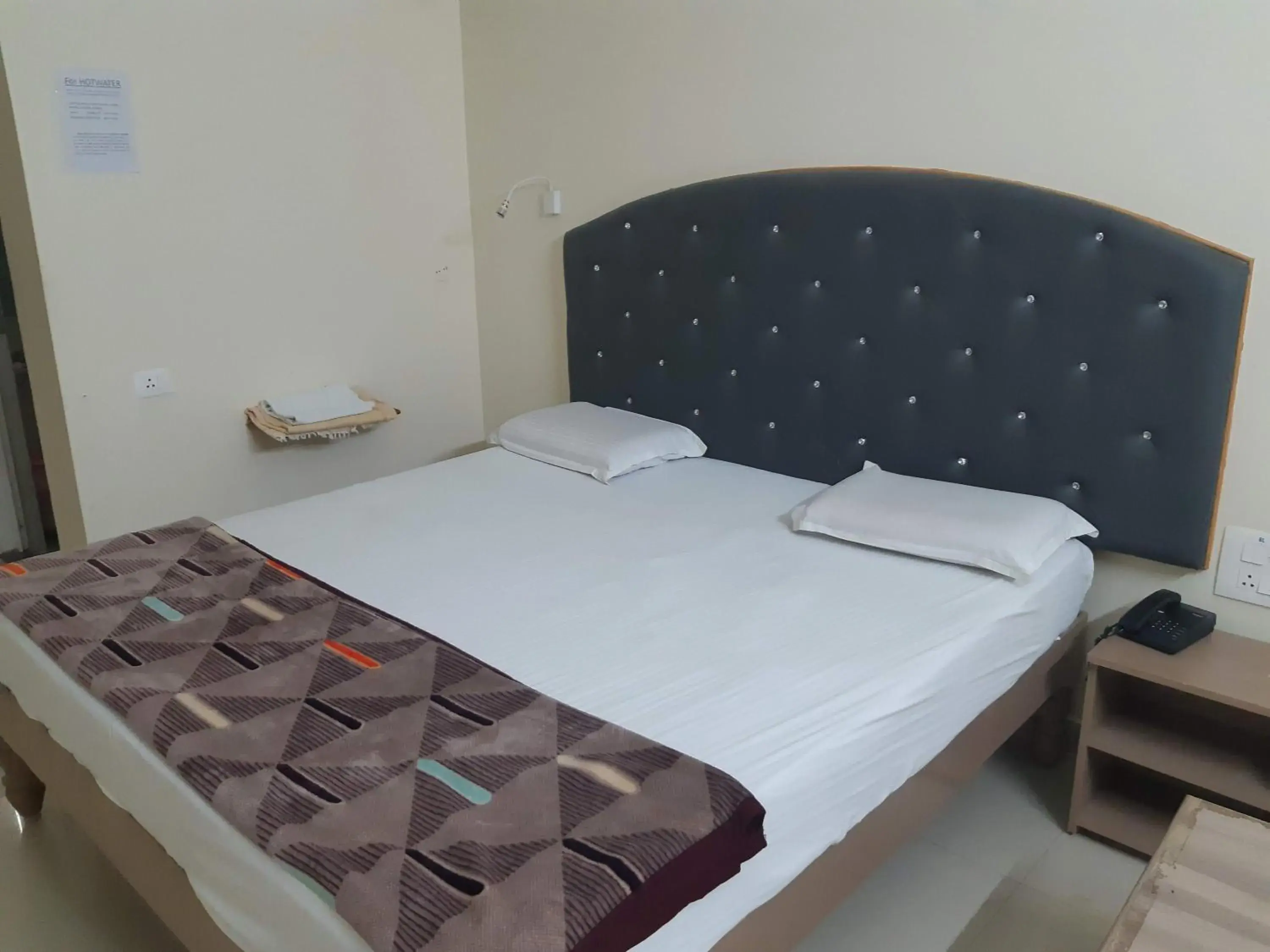 Bed in Srinivasa Hotel Bed in Srinivasa Hotel