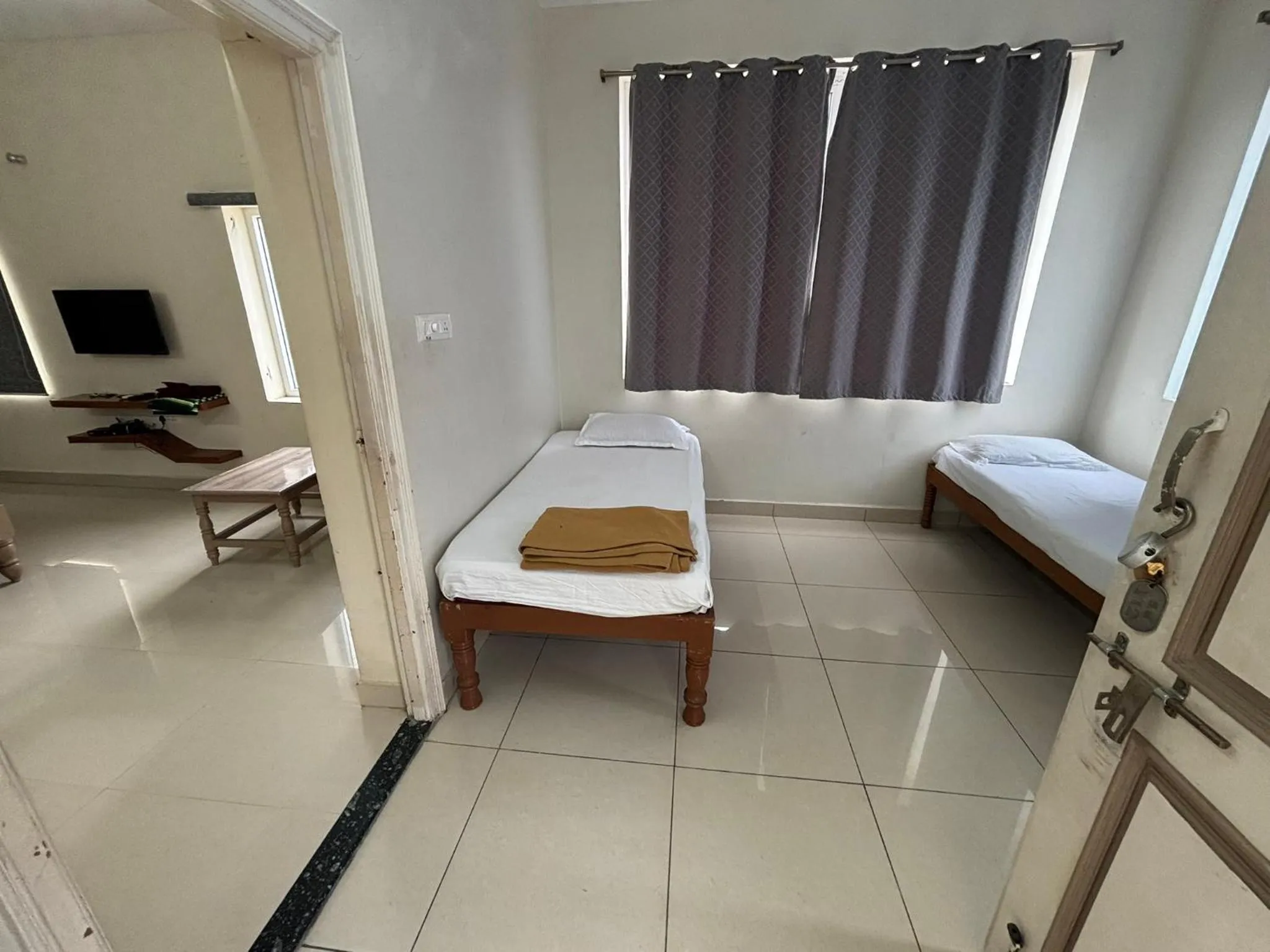 Bed in Srinivasa Hotel