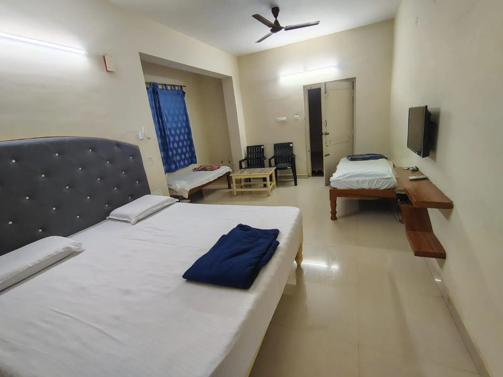 Bed in Srinivasa Hotel
