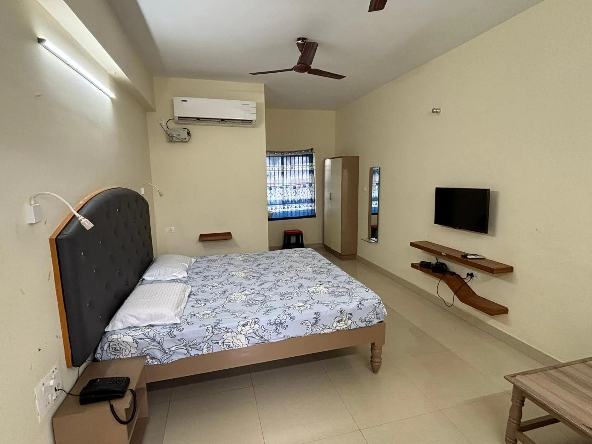 Bed in Srinivasa Hotel