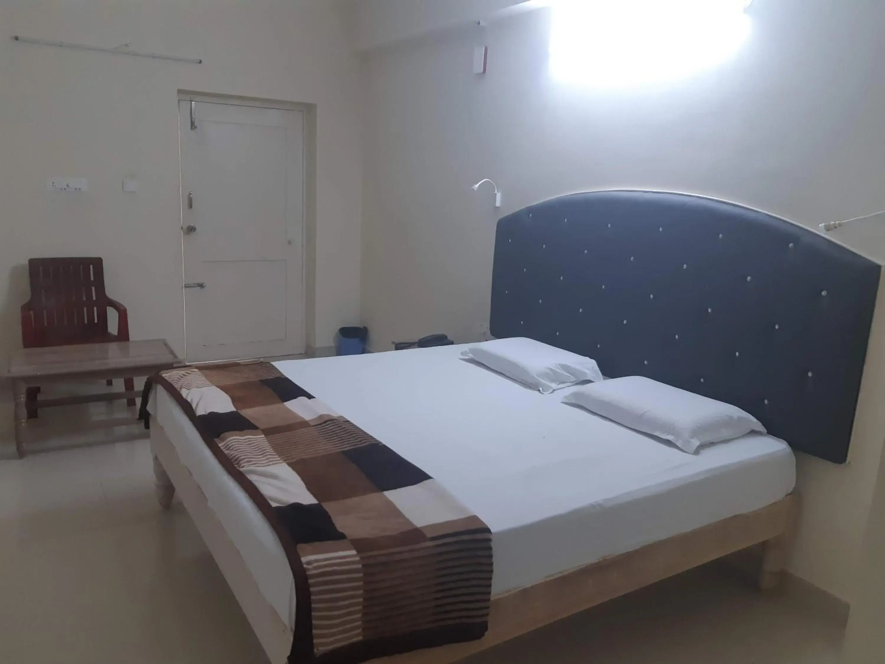 Bed in Srinivasa Hotel Bed in Srinivasa Hotel