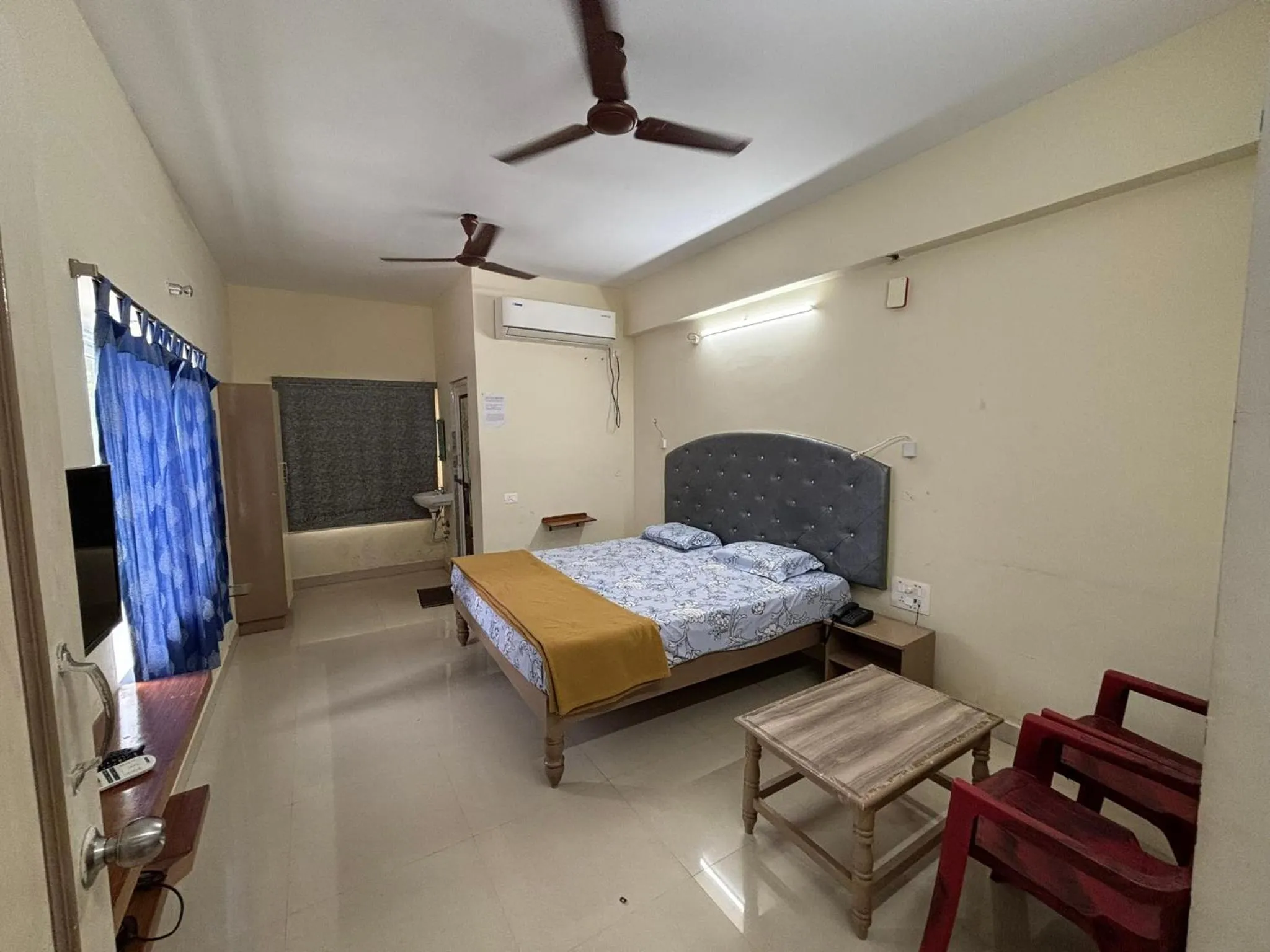 Bed in Srinivasa Hotel