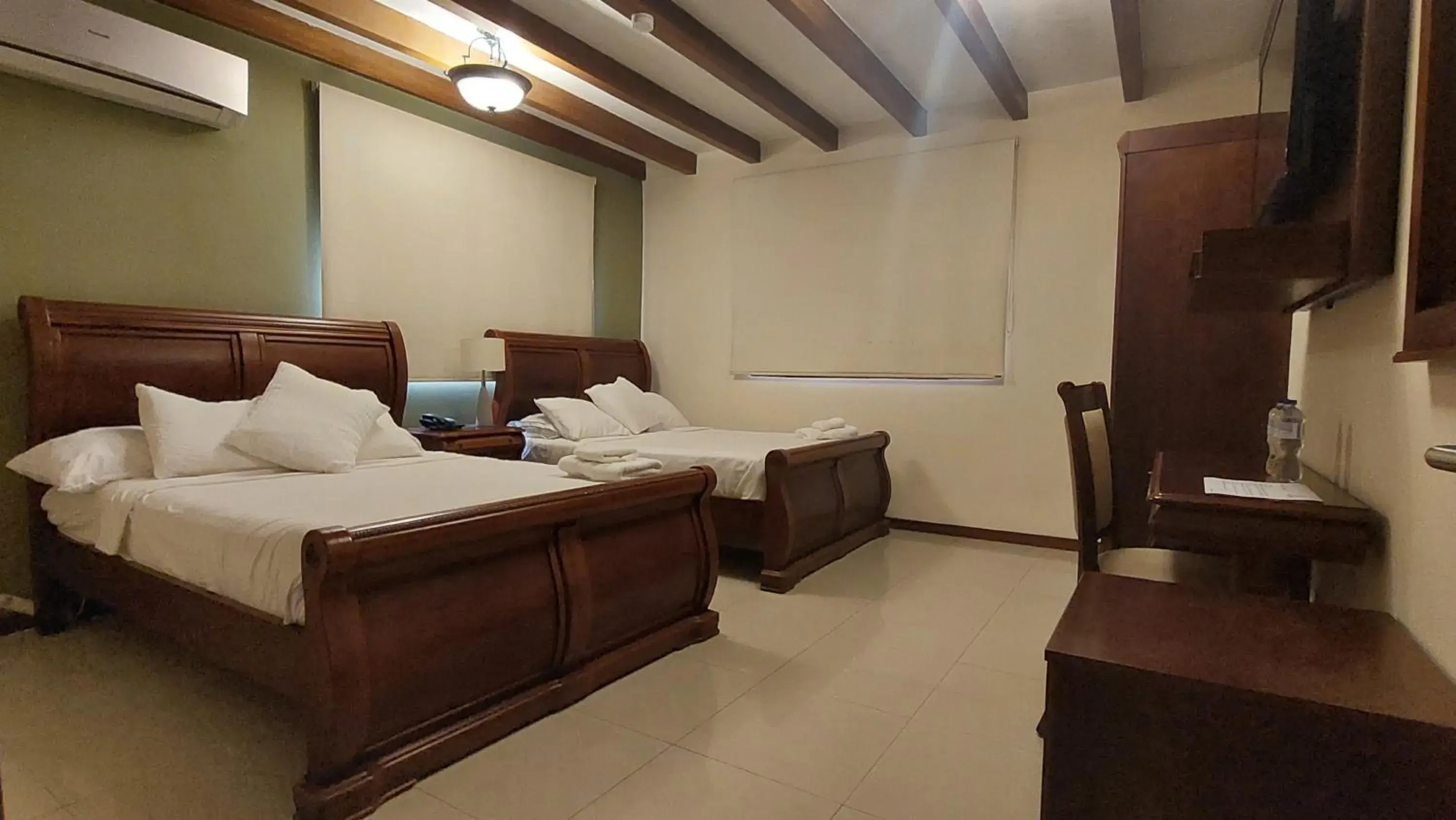 Deluxe Quadruple Room in Hotel Voyager Manta Deluxe Quadruple Room in Hotel Voyager Manta