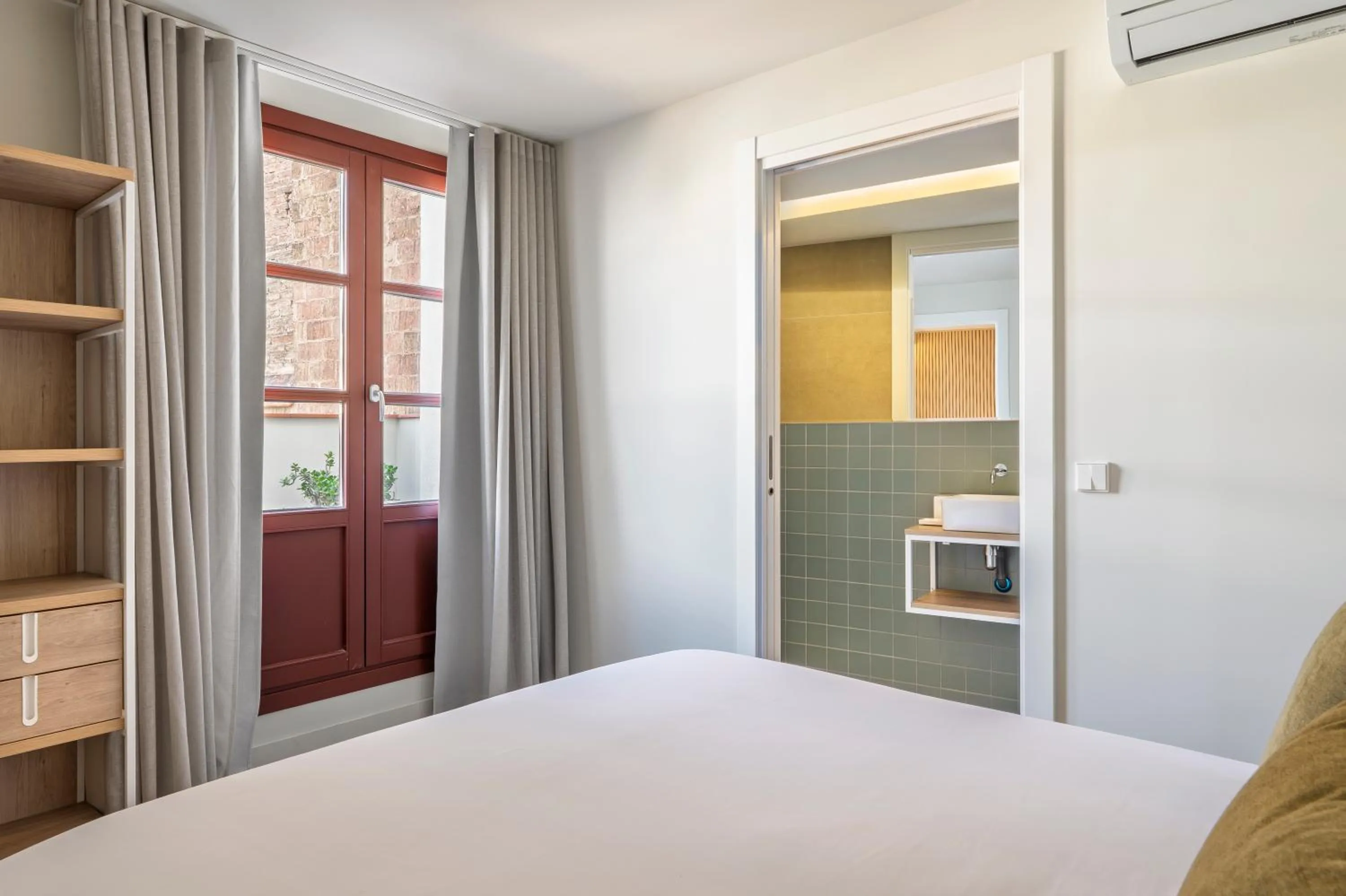 Bedroom, Bed in Aspasios Garden Apartments