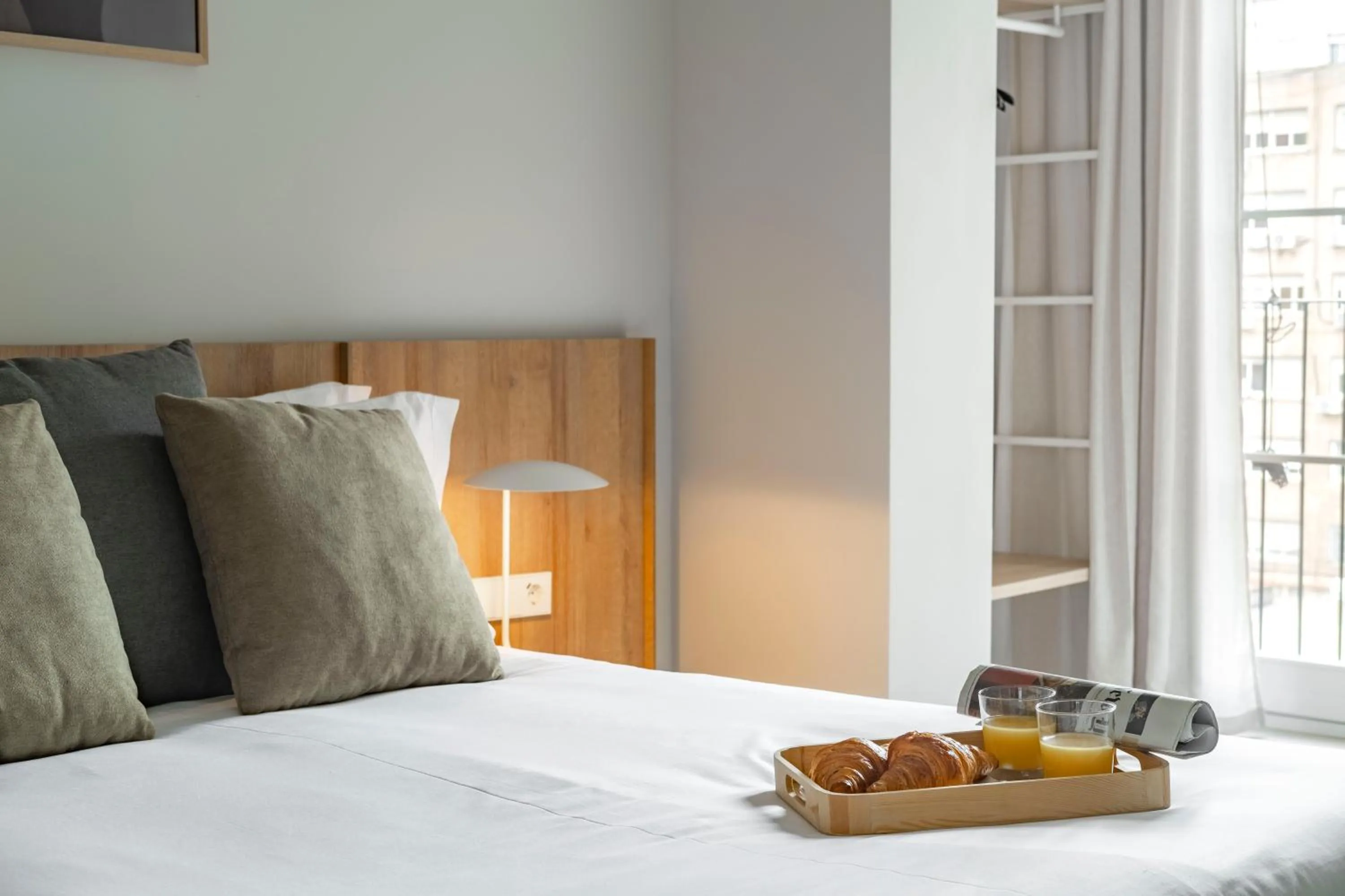 Bedroom, Bed in Aspasios Garden Apartments