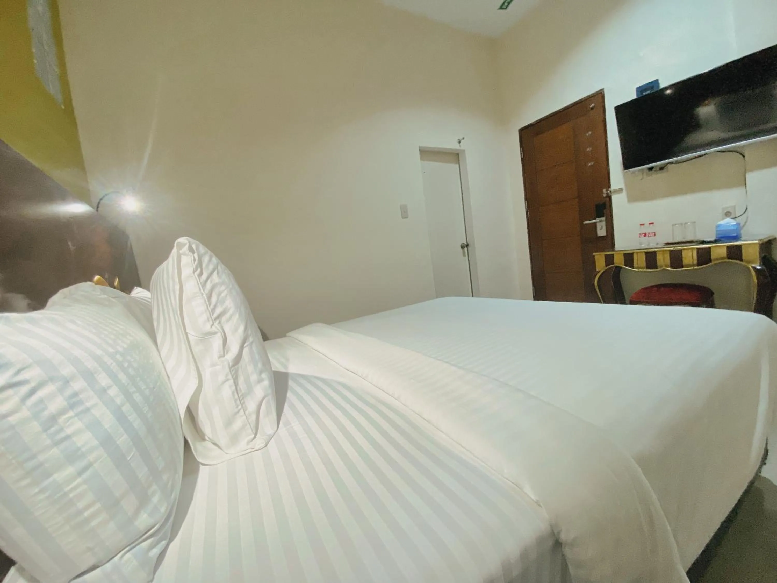 Bed in JIYO BOUTIQUE Hotel